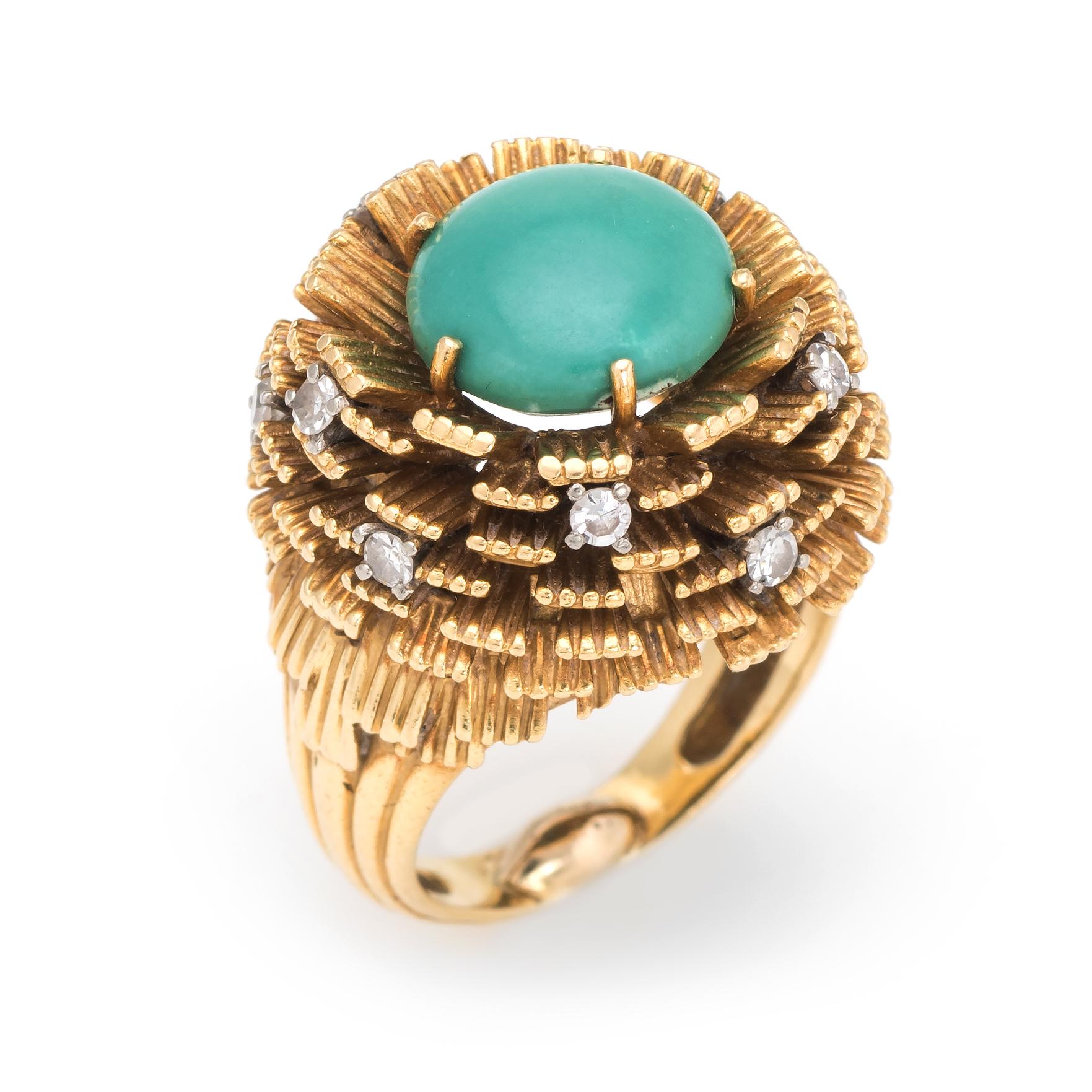 Finely detailed vintage turquoise & diamond ring (circa 1970s), crafted in 18k yellow gold. 

Centrally mounted turquoise cabochon measures 10mm (estimated at 5 carat). The 10 diamonds are estimated at 0.01 carats each and total an estimated 0.10