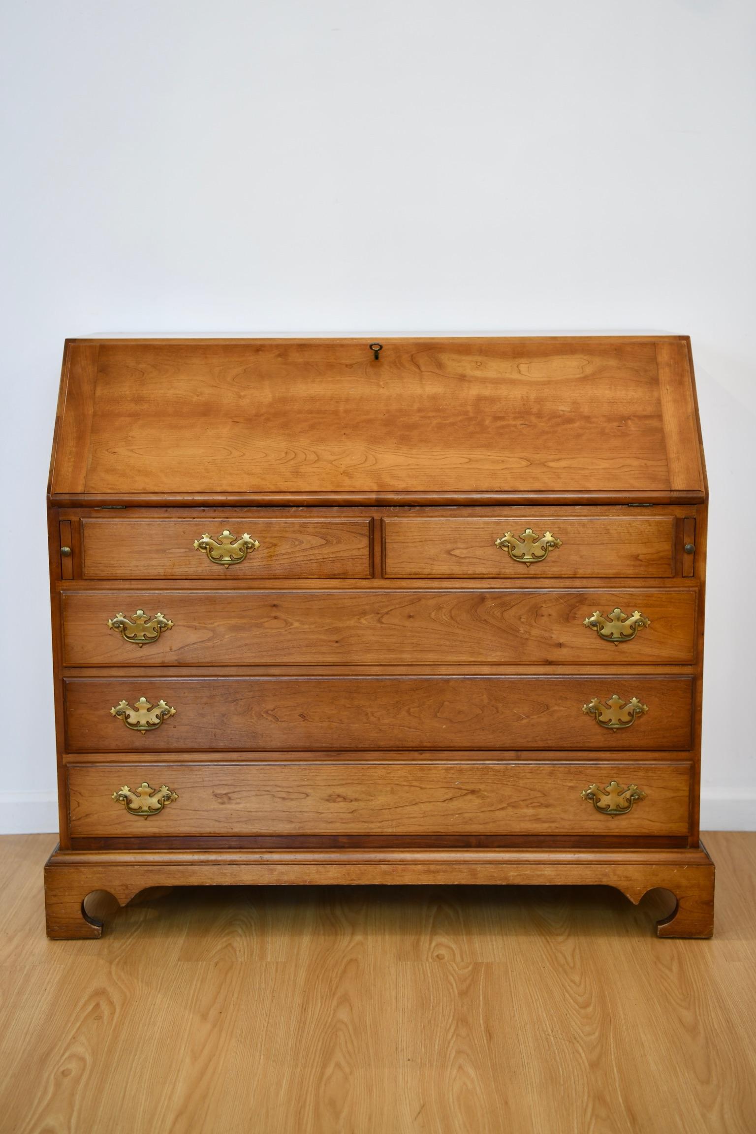 Vintage cherry wood slant front desk by L. & J.G. Stickley, stamped 1962. Dimensions: (closed) 40
