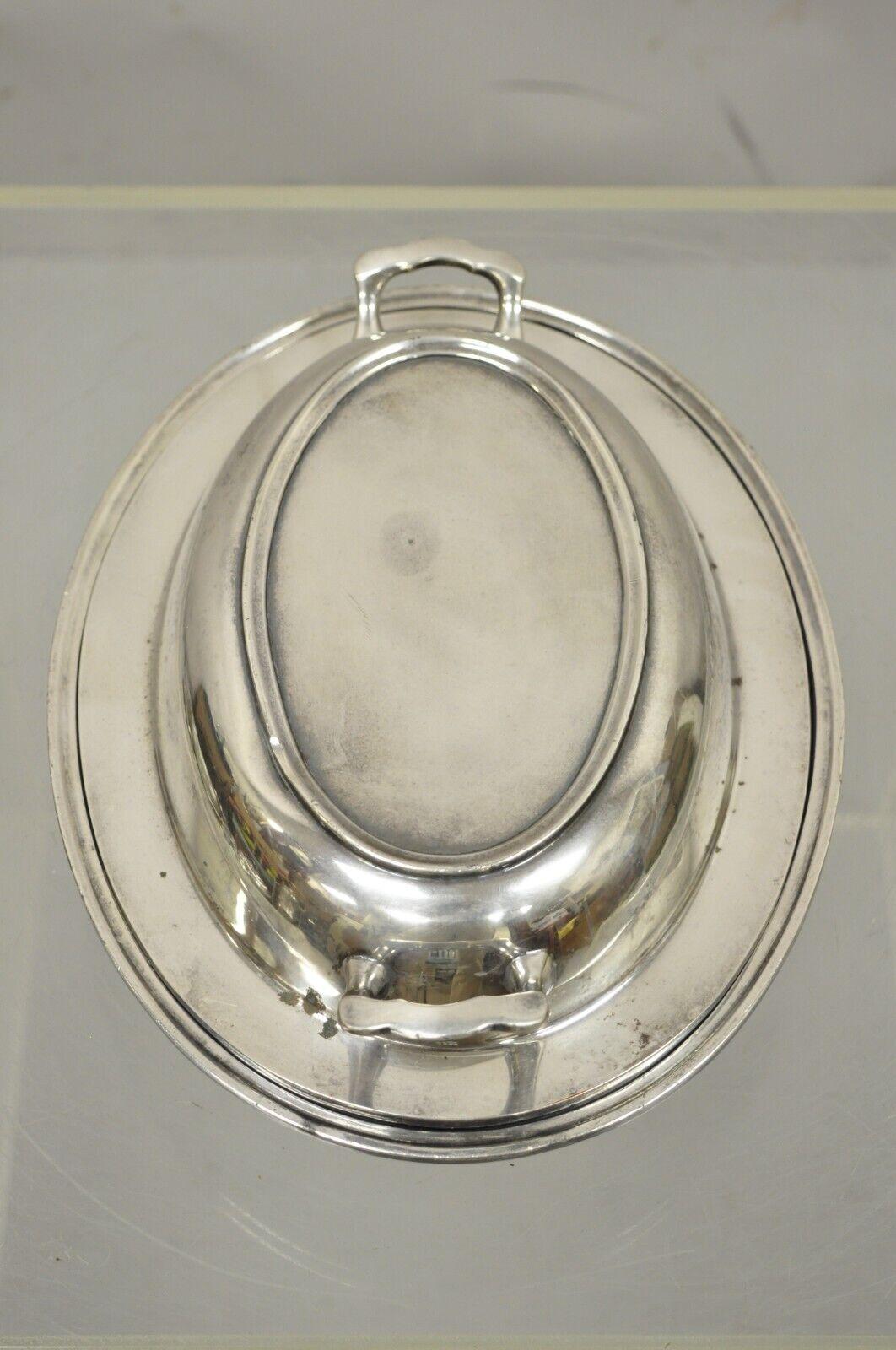 silver vegetable dish with lid