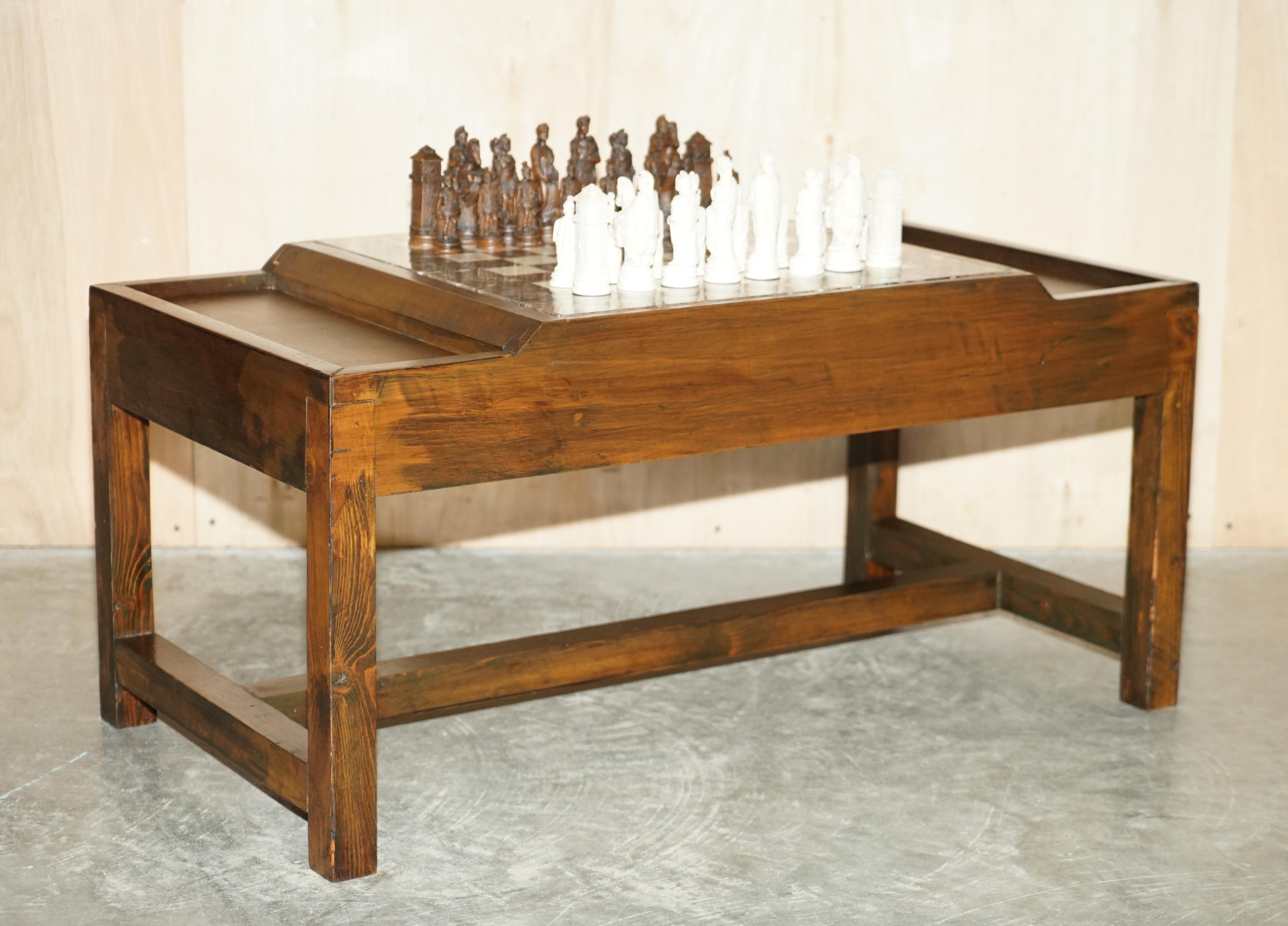 We are delighted to offer for sale this lovely English oak vintage chess coffee table with marble chess board and period ebonised chess set.

A good looking and well made piece, it can be used as a normal coffee table of course, it has a thick cut
