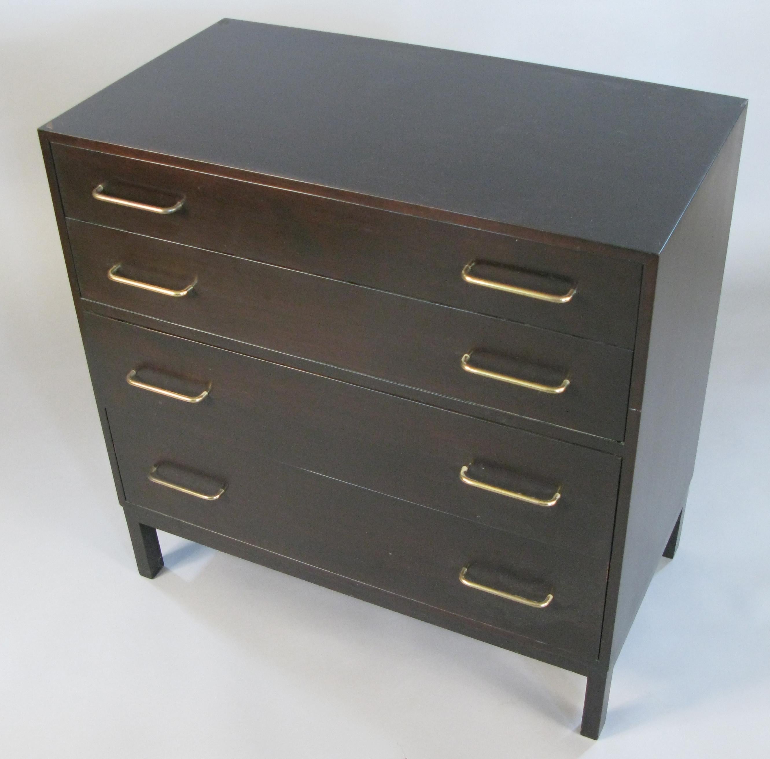 A very handsome vintage 1960s four-drawer chest designed by Edward Wormley for Dunbar. Graduated height drawers have the original brass hardware, and the top drawer is divided. Case has the original dark brown finish, with age expected wear. Top