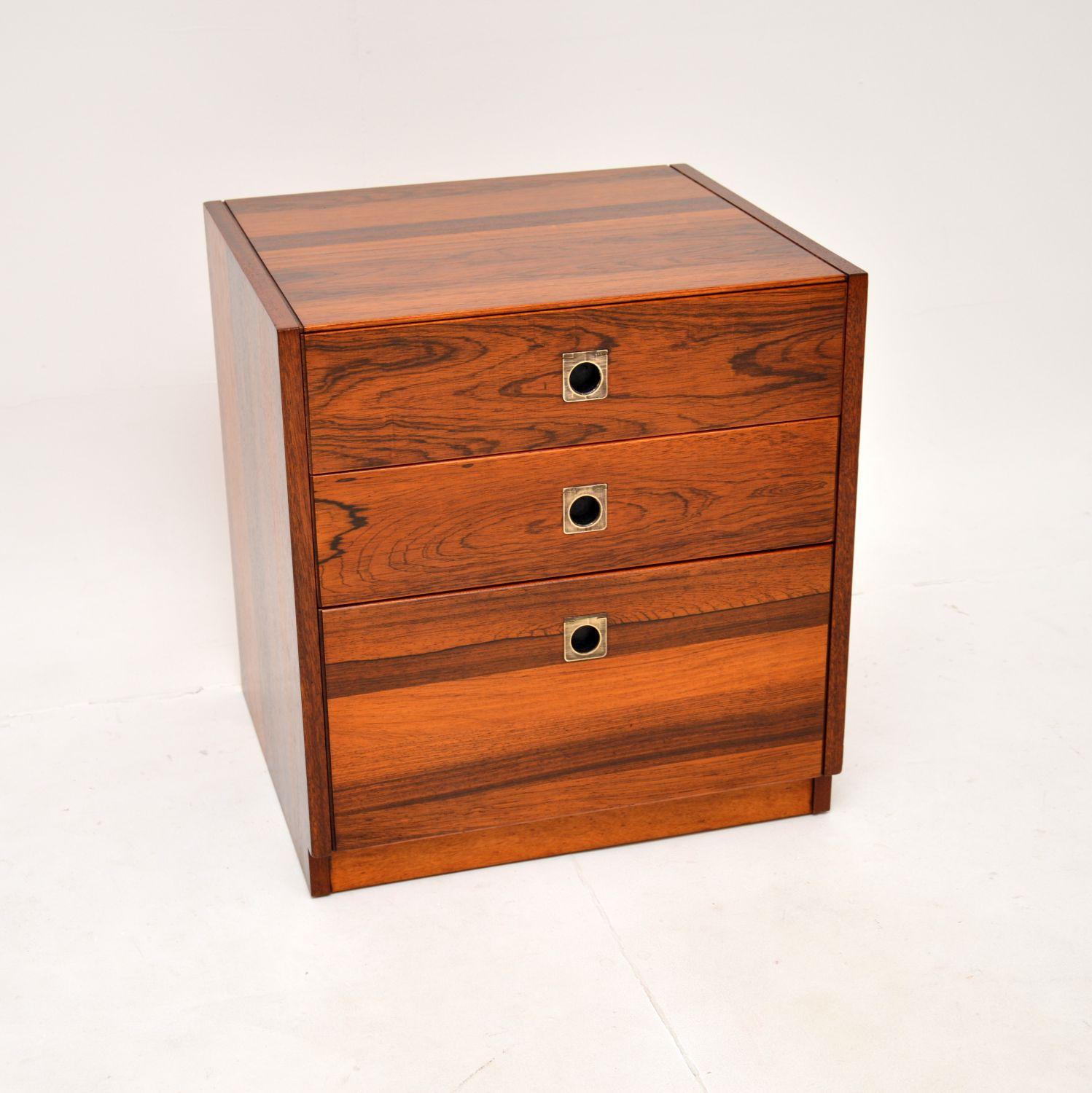 A stunning vintage chest of drawers by Robert Heritage for Archie Shine. This was made in England, it dates from the 1960’s.

It is of amazing quality, with beautiful grain patterns and fantastic inset military style handles. It is a very useful