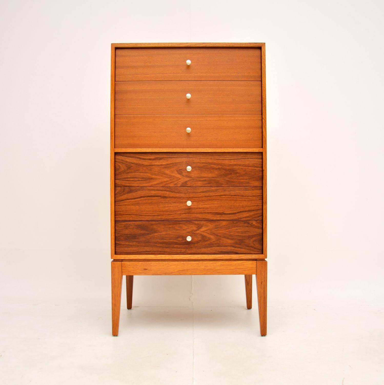 A very stylish and extremely well made vintage chest of drawers by Uniflex. This was made in England, it dates from the 1950-60’s.

It is of superb quality and is a very useful size. It is tall and slim, with lots of storage space. The drawer fronts
