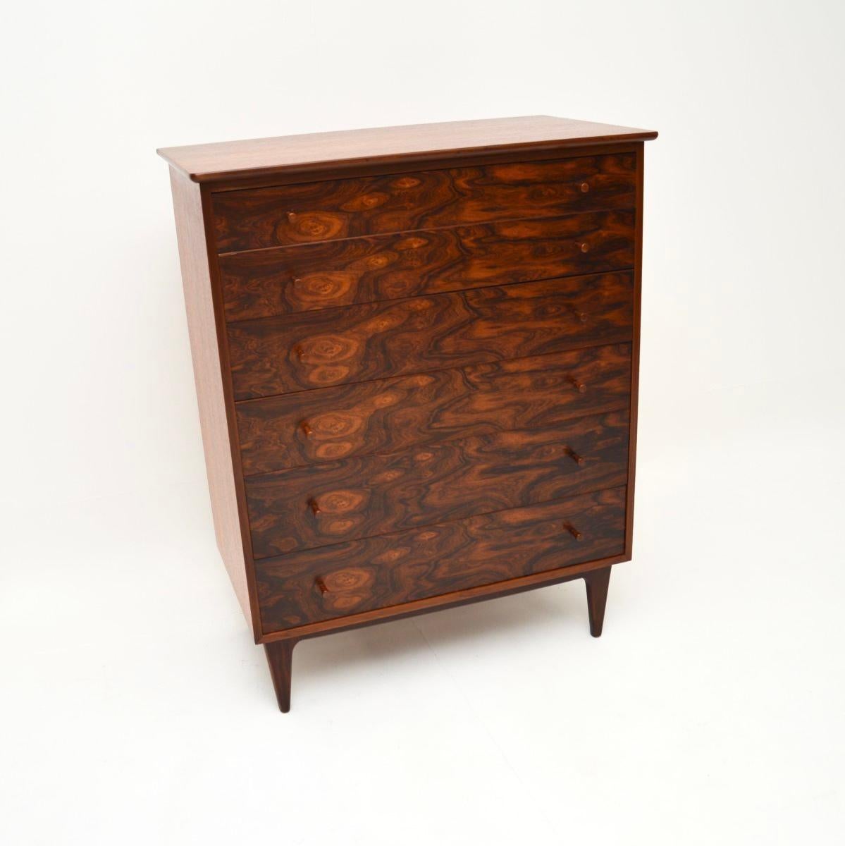 A stunning and extremely well made vintage teak chest of drawers by Younger. This was made in England, it dates from the 1960’s.

The quality is outstanding, this is a great size and offers lots of storage space. The drawer fronts have incredibly