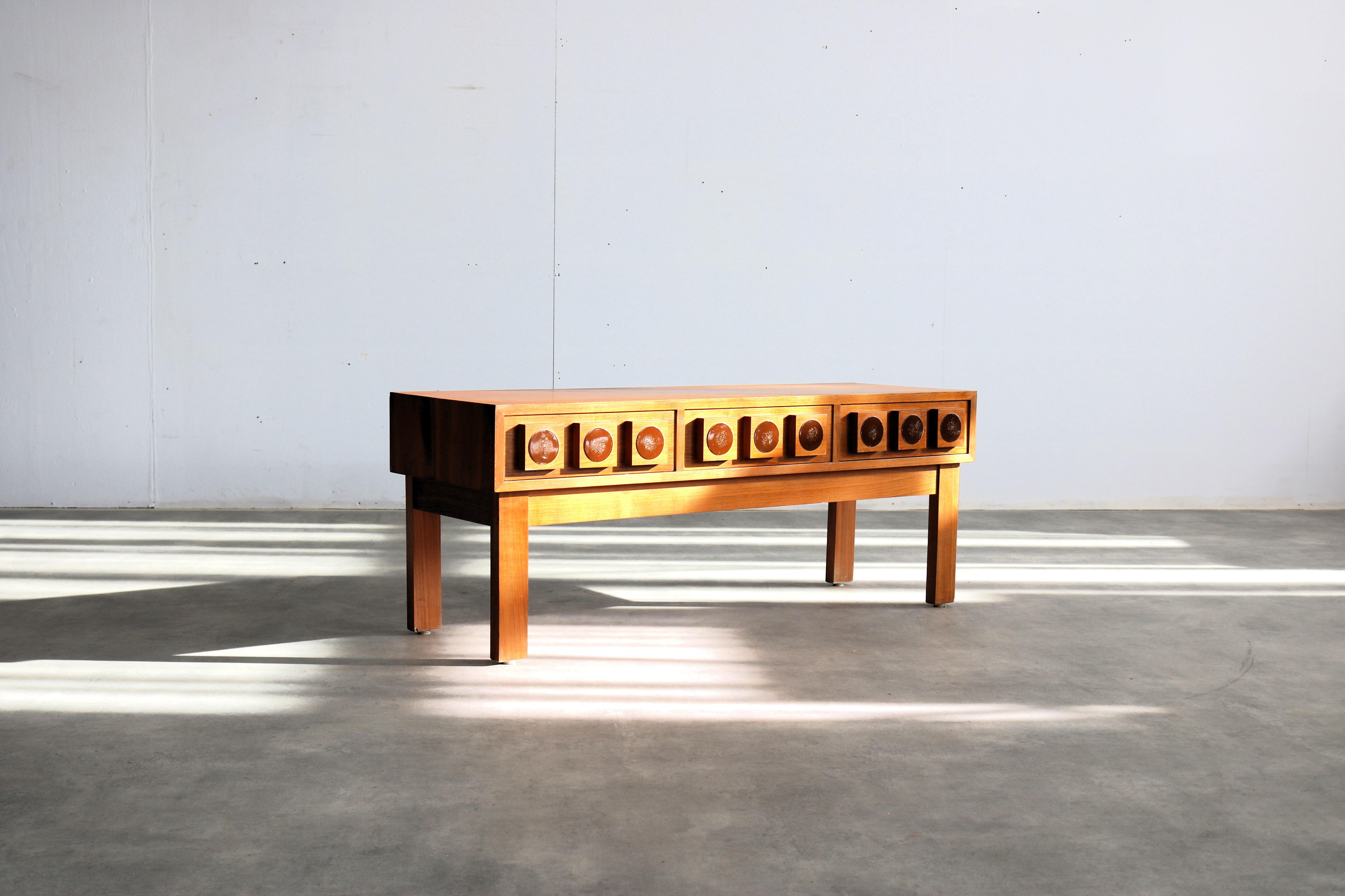 vintage chest of drawers  TV cabinet  60s  Glass & Tra

period  60's
design  Lars-Goran Nilsson  Glass & Tra  Sweden
condition  good  light signs of use
size  45 x 116 x 39 (hxwxd)

details  teak; metal;

article number  2565