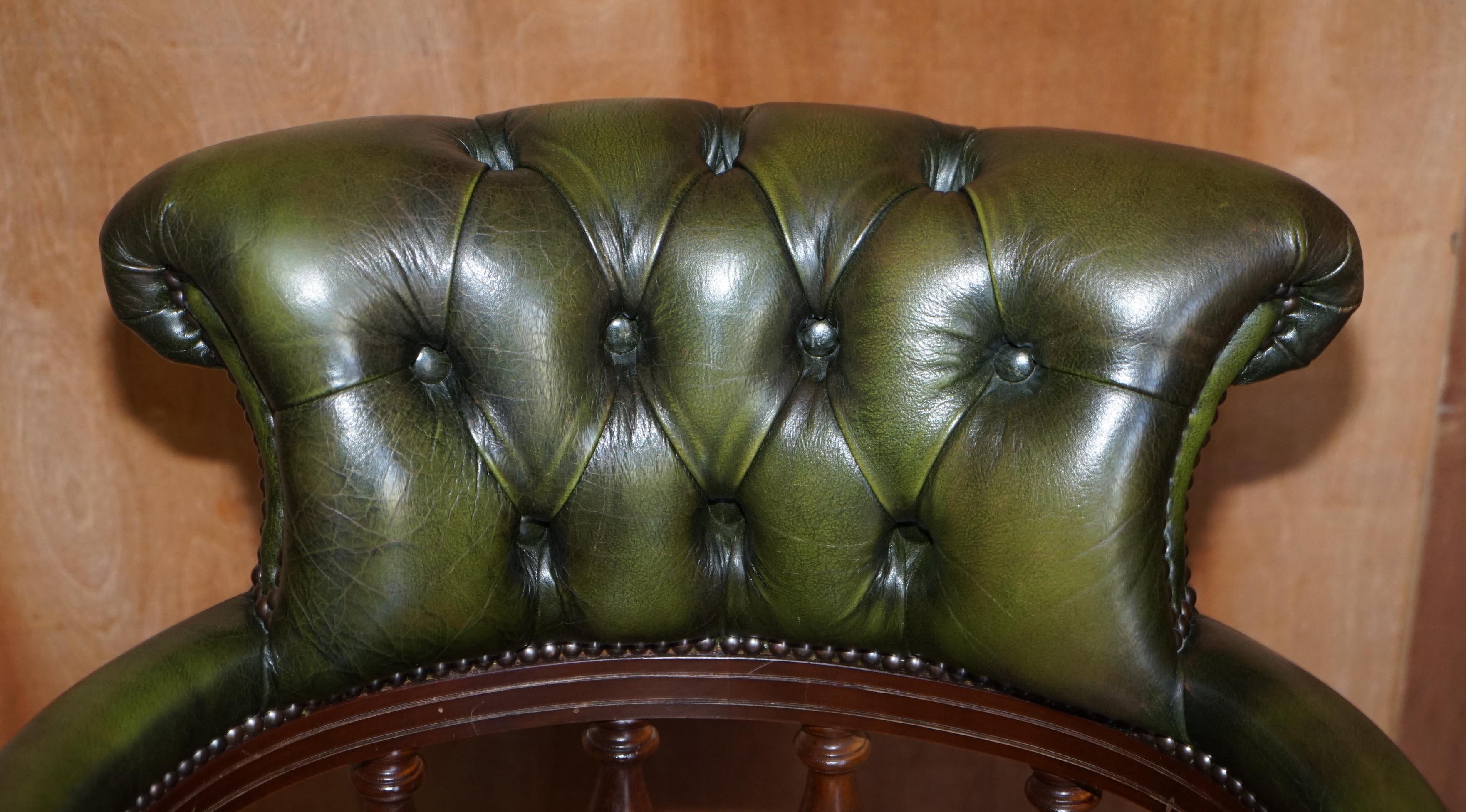 green leather chesterfield swivel chair