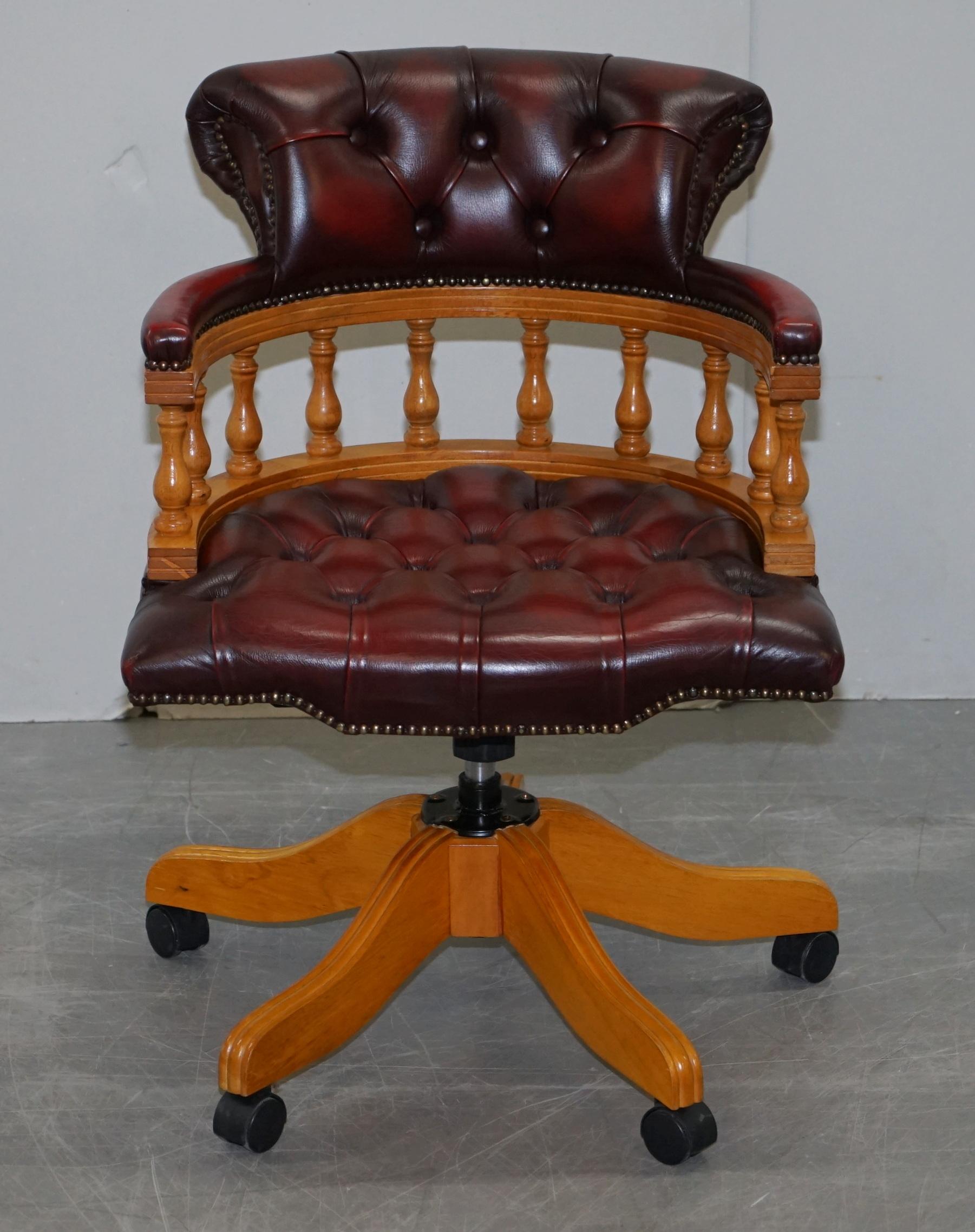 I am delighted to offer for sale this lovely hand made Chesterfield fully buttoned Oxblood leather Captains or Directors armchair

A good looking well made and decorative captains chair, it has a light beech wood frame with a yew finish and