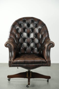 Vintage Chesterfield office chair with decorative nails in English style
