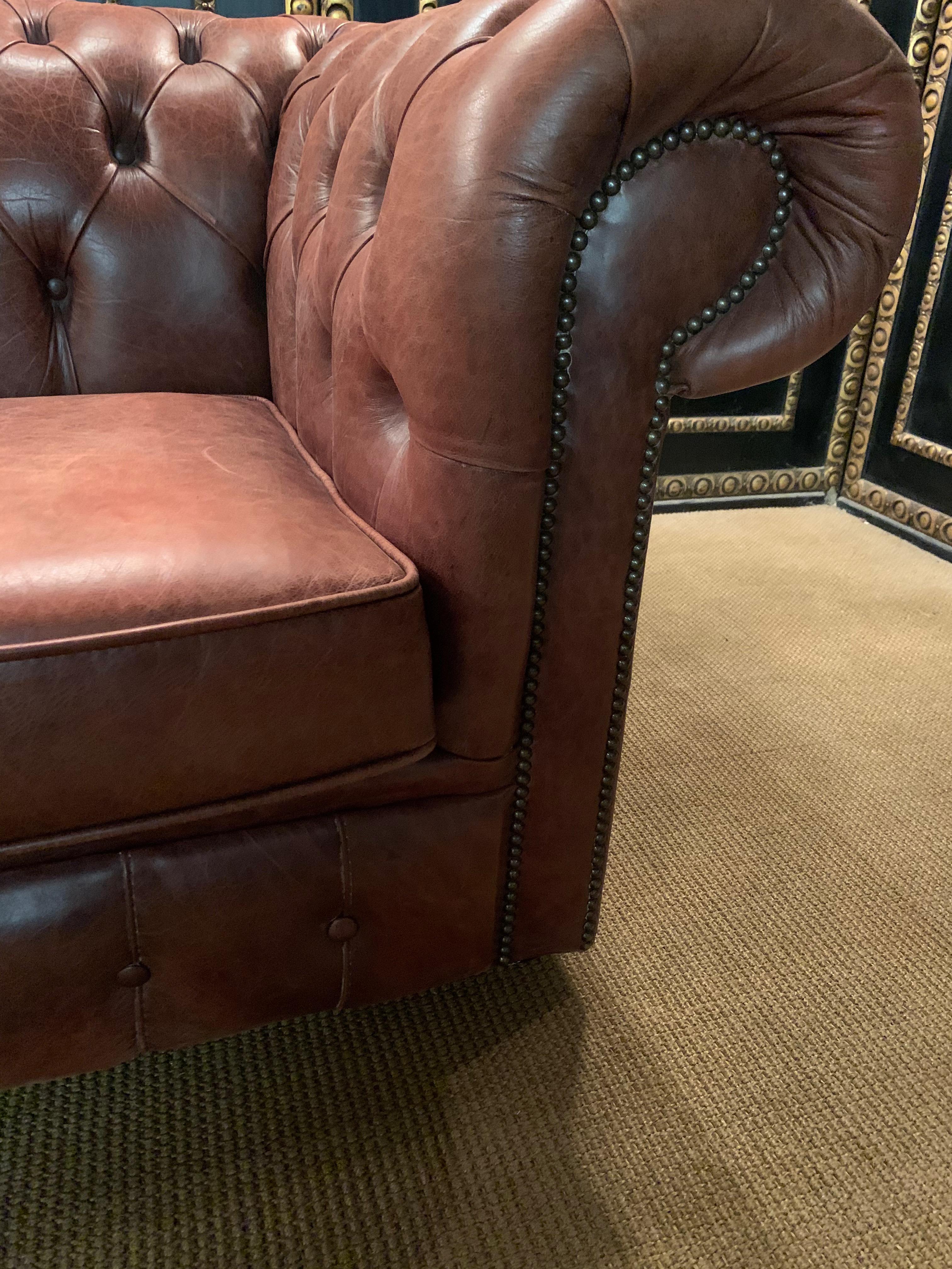 20th Century Vintage Chesterfield Sofa Cognac / brown Leather Mounted with Numerous Buttons For Sale