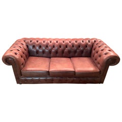 Vintage Chesterfield Sofa Cognac / brown Leather Mounted with Numerous Buttons