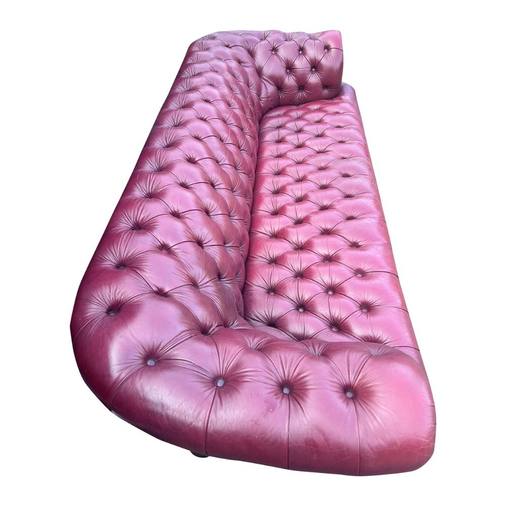 Vintage Chesterfield Tufted Leather Sofa Red Brass Rivets 3-Seater Modern Style

This vintage Chesterfield tufted leather sofa with brass rivets in oxblood red is a stunning piece of furniture that brings both style and comfort to any space. Crafted
