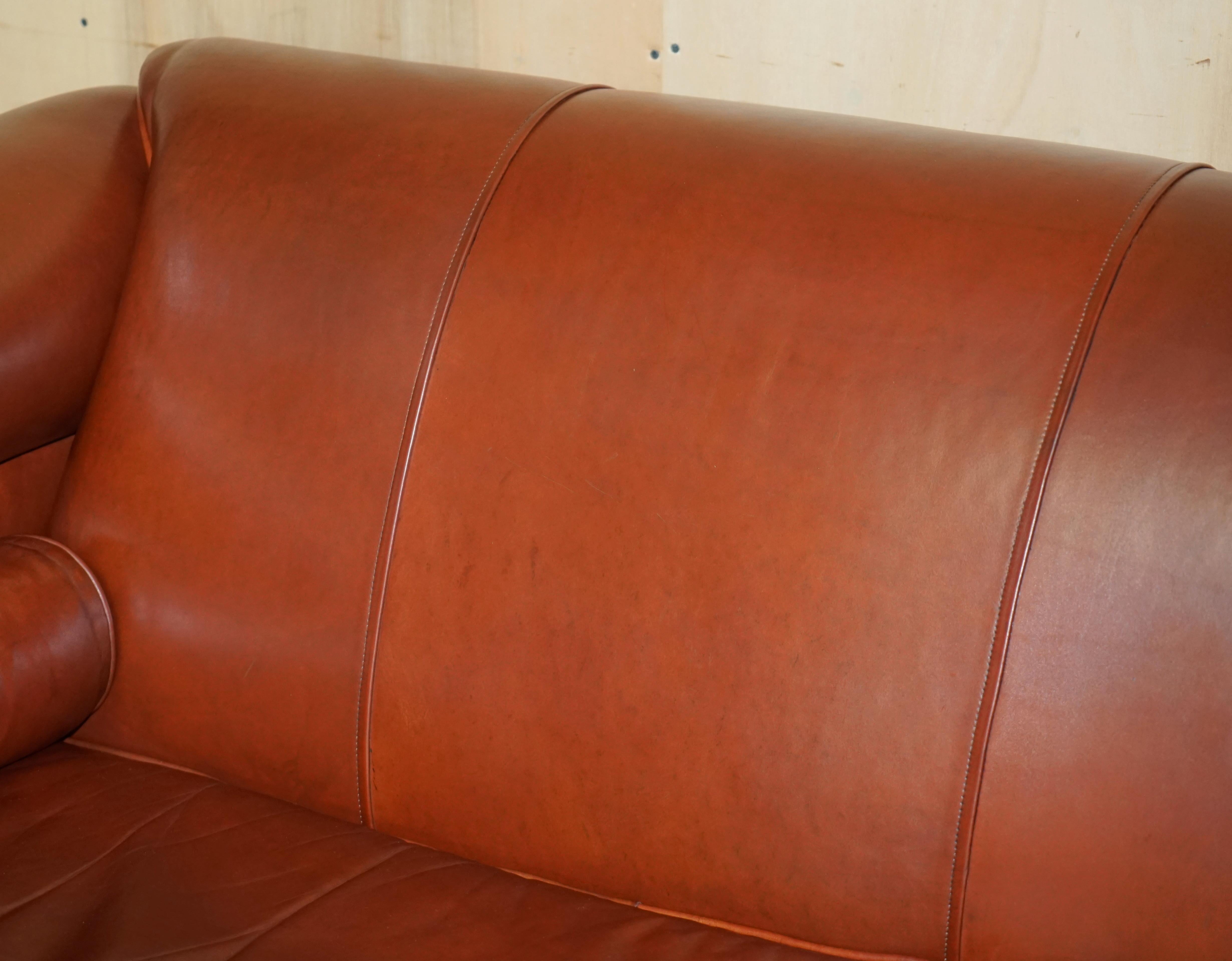 Hand-Crafted ViNTAGE CHESTNUT BROWN LEATHER LIBERTY'S ART NOUVEAU CLUB SOFA CARVED WOOD FRAMe For Sale