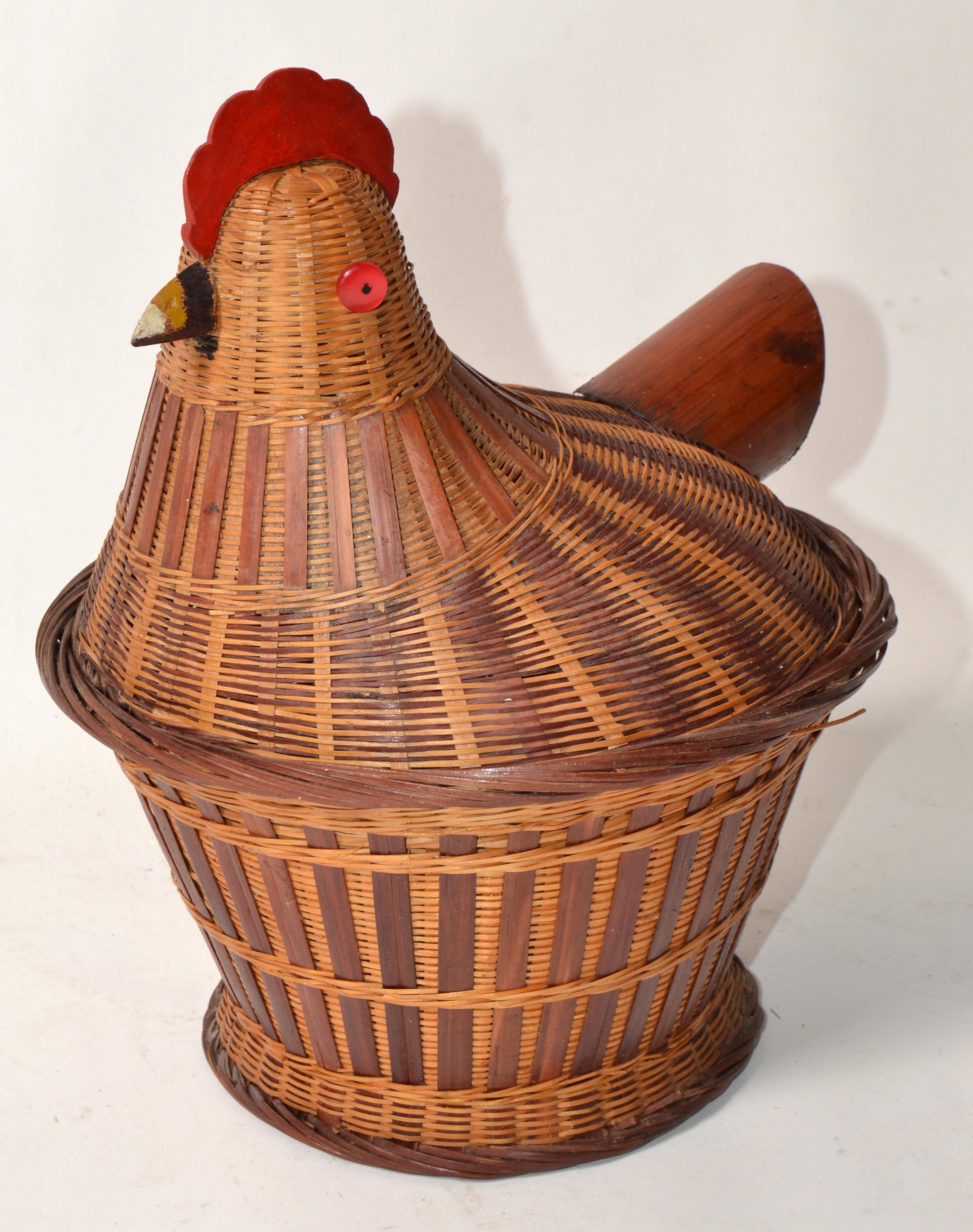 Collectible 1960s kitchen decoration figural Wicker hand-woven lidded Basket. Hen Sitting on nest. Hen is the lid with attached red wood comb and beak and Red Button Eyes the tail is bamboo. The basket itself has a double layer so that the hen has a