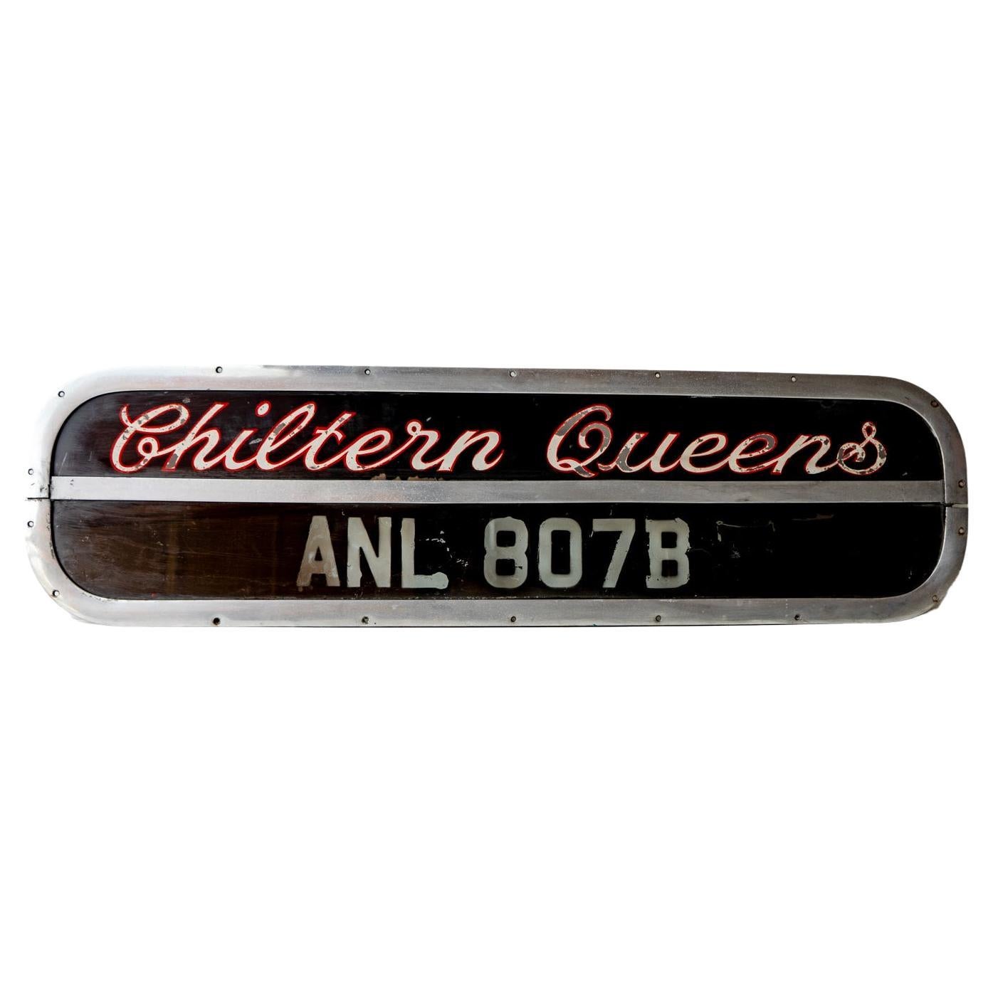 ORIGINALLY FROM A PLAXTON PANORAMA COACH BUILT AEC RELIANCE BUS

Curvacious metal framed sign with italic red and white script logo for the Chiltern Queens coach company on a black background.

Would have originally been on the rear of the bus.

The