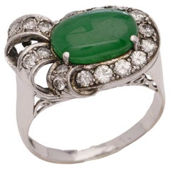 Retro Chinese 18kt. white gold oval cabochon jade and diamond ladies' ring