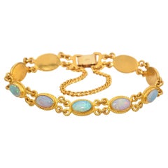 Bracciale cinese vintage in oro giallo 24 carati con opale