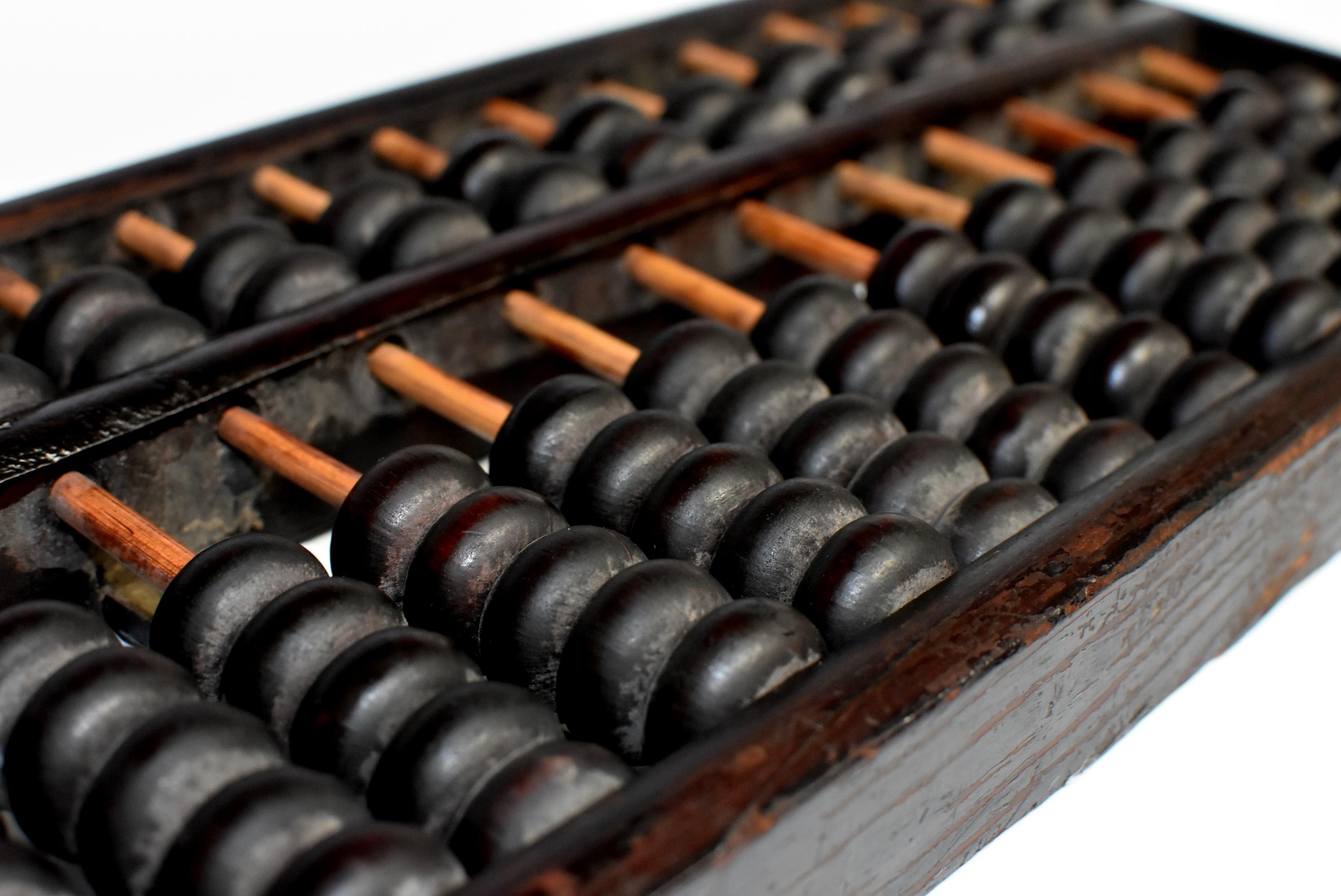 This is an authentic Chinese abacus that was used in the 20th century. The Abacus being an ingenious calculator has been used in China for over a thousand years. Its accuracy and speed remains extraordinary till this day of age. This particular