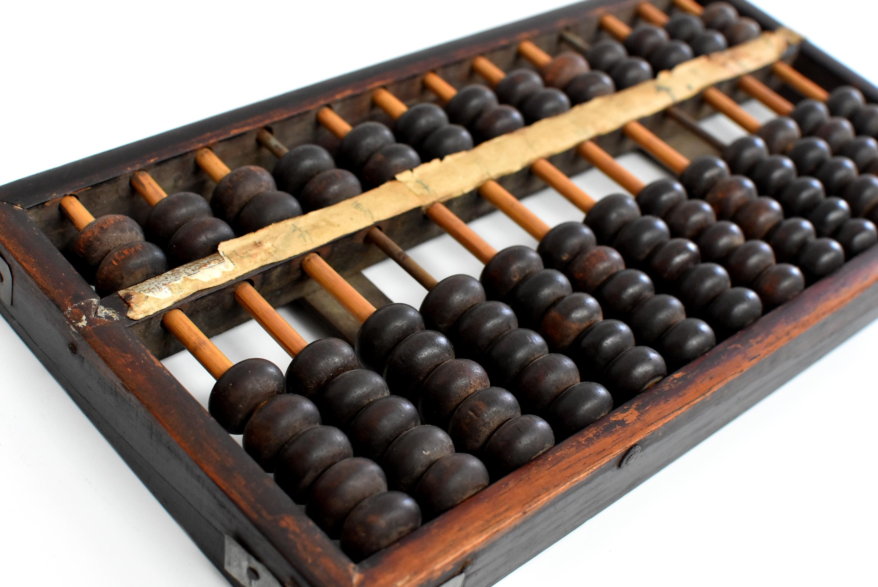 This is an authentic Chinese abacus that was used in the early 20th century. The Abacus being an ingenious calculator has been used in China for over a thousand years. Its accuracy and speed remains extraordinarily impressive till this day of age.