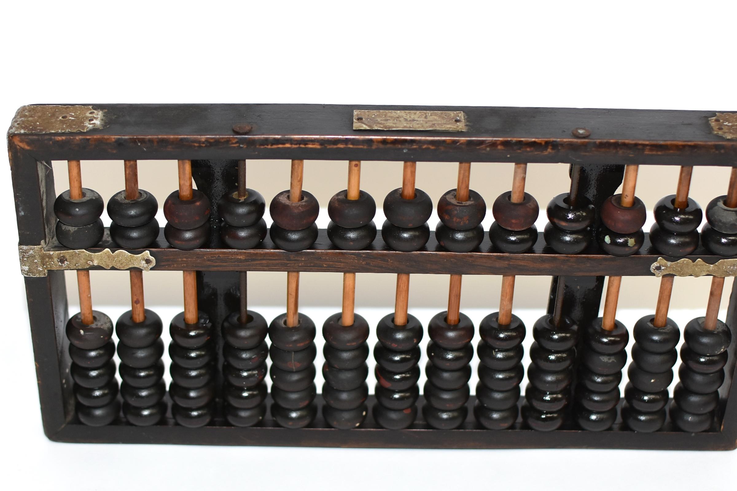 This is an authentic Chinese abacus that was used in the early 20th century. The Abacus being an ingenious calculator has been used in China for over a thousand years. Its accuracy and speed remains extraordinary till this day of age. This special