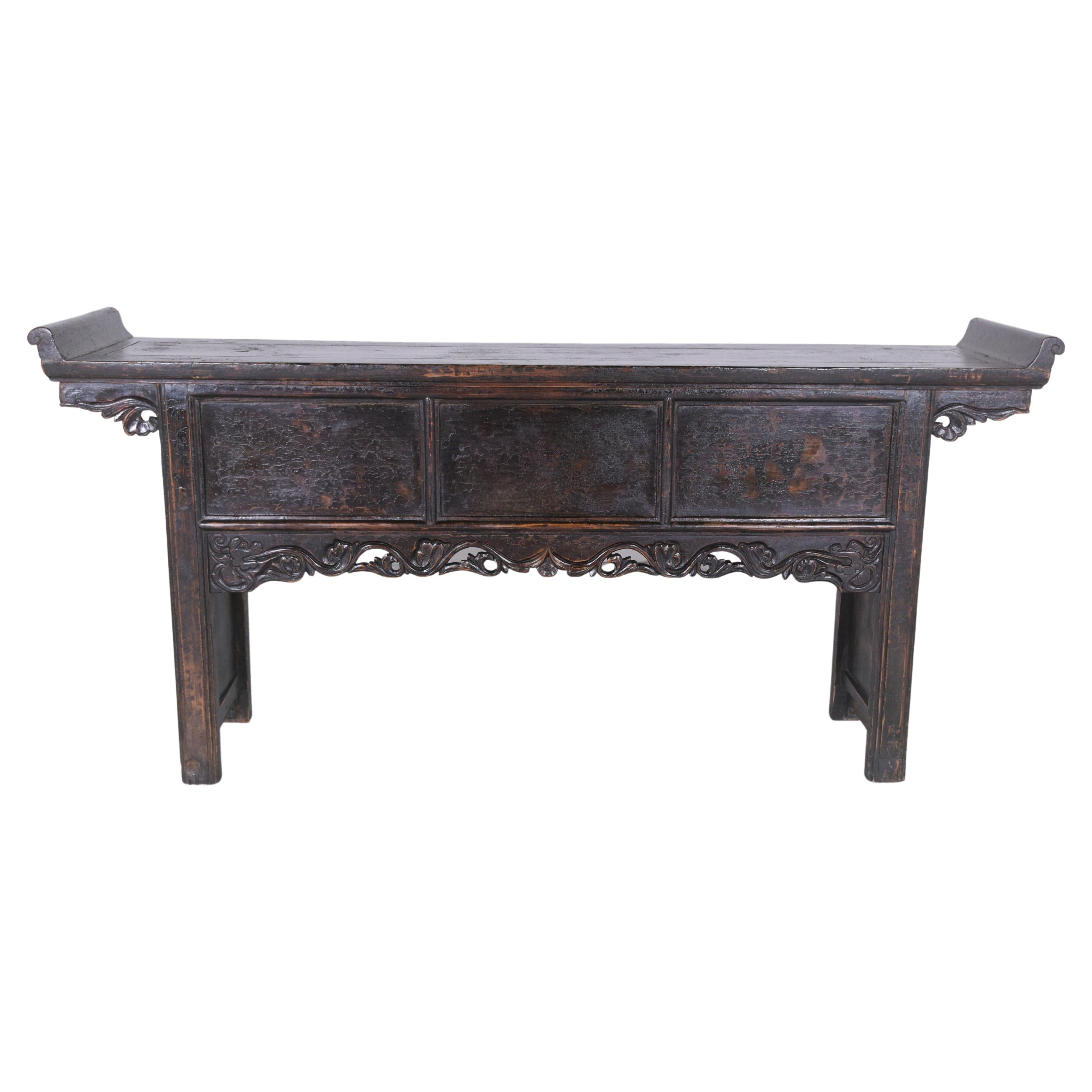 Embrace the rich heritage and exquisite craftsmanship of the early 20th century with our vintage Chinese altar console. This piece, hailing from the 1900s, has been thoughtfully restored, waxed, and polished by our team of professional craftsmen,