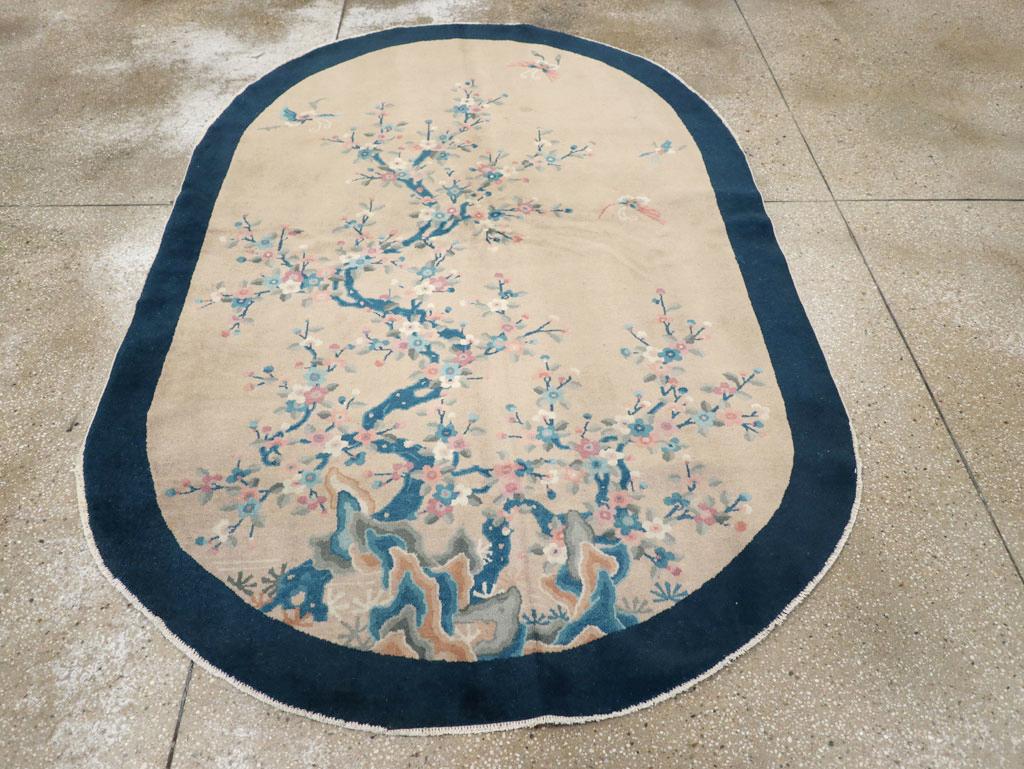 This mid-20th century Chinese Art Deco rug, measuring 5' 2