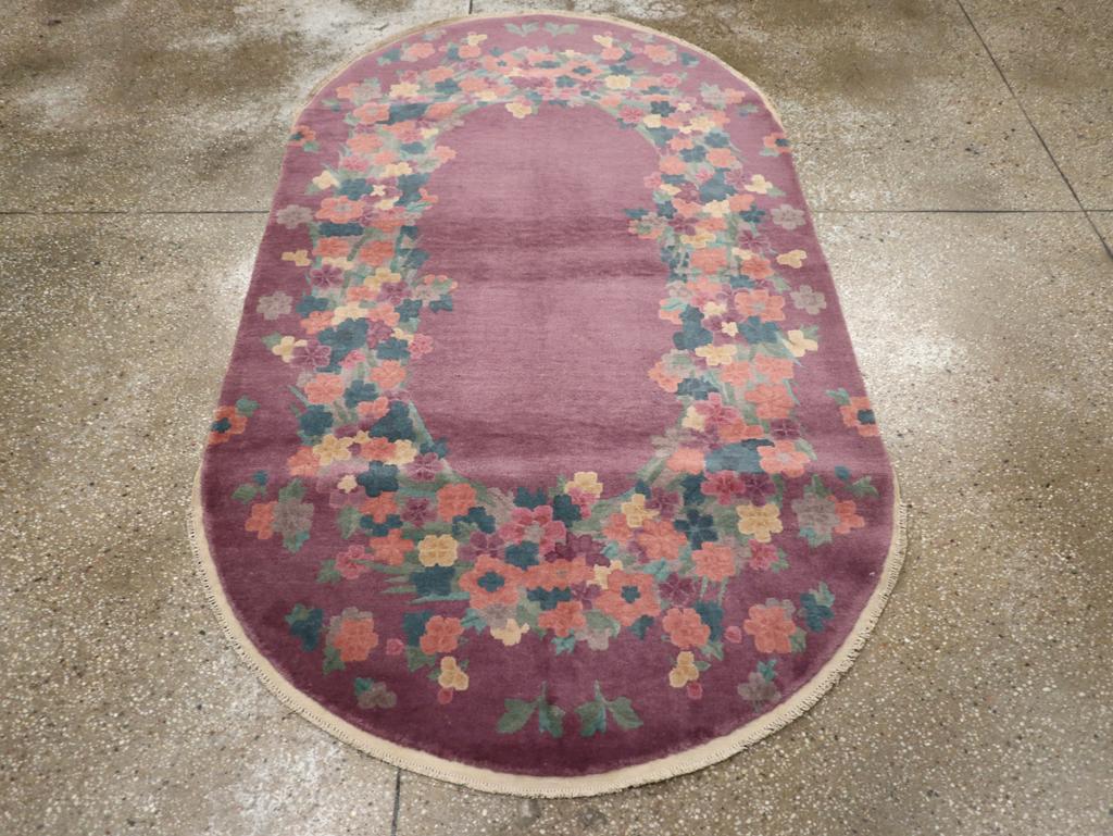 This mid-20th century Chinese Art Deco rug, measuring 4'0