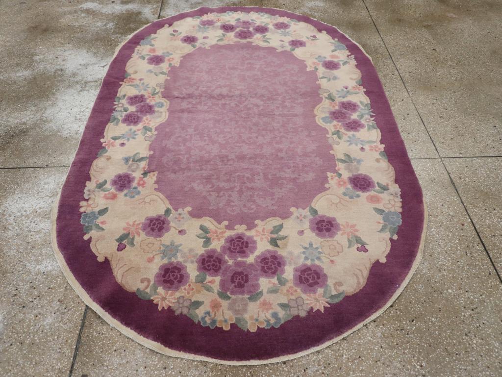 This mid-20th century Chinese Art Deco rug, measuring 5' 0