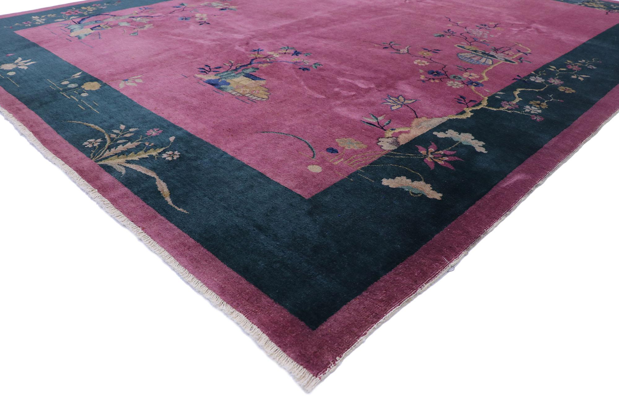 77629 Antique Chinese Art Deco Rug Inspired by Walter Nichols 09'00 x 11'09. This hand knotted wool antique Chinese Art Deco rug features a color-blocked field and border scheme festooned with large, glorious sprays of flowers. Lotuses, peonies,