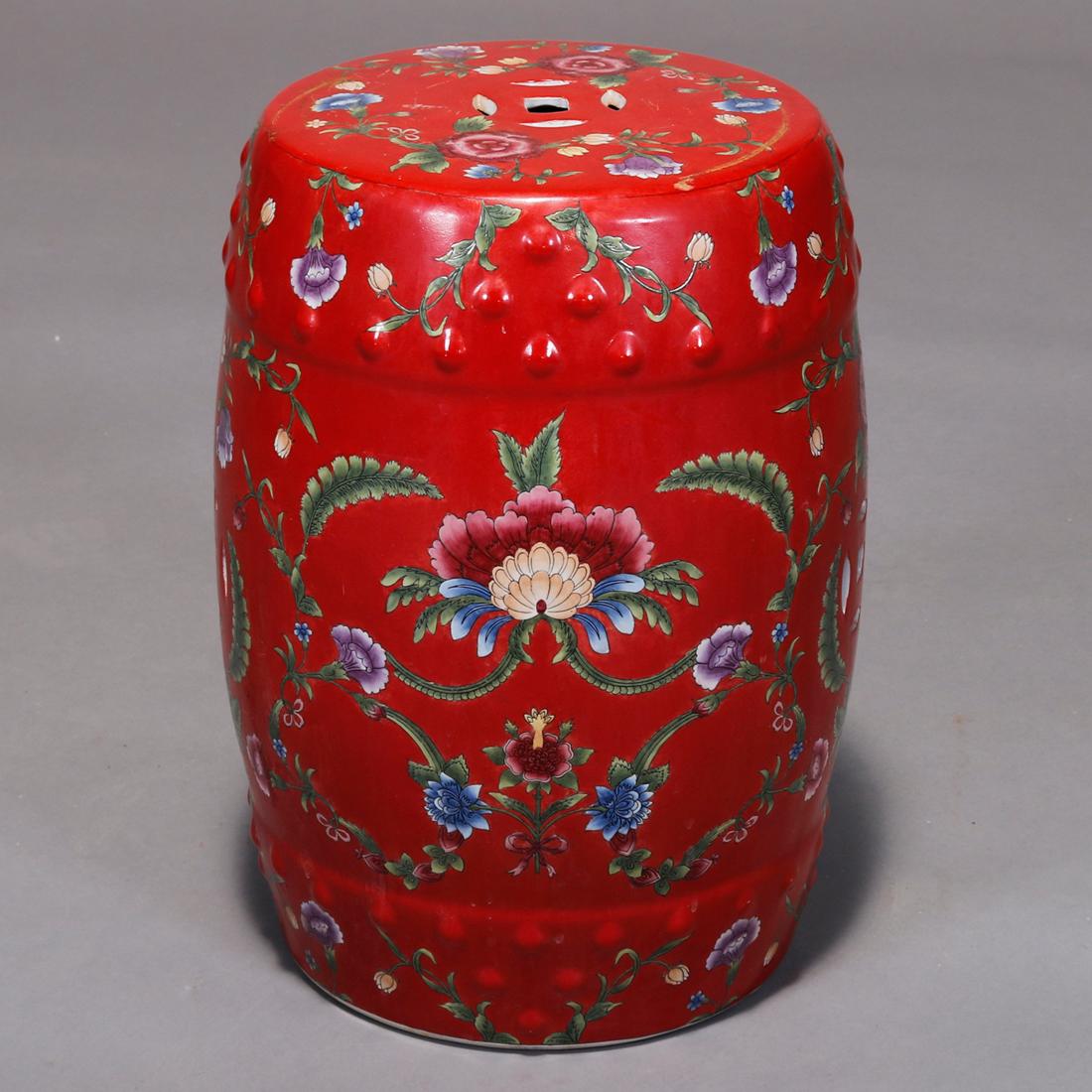 A vintage Chinese garden seat offers glazed pottery construction with allover hand painted floral decoration and pierced with textured upper and lower bands, 20th century

Measures: 18