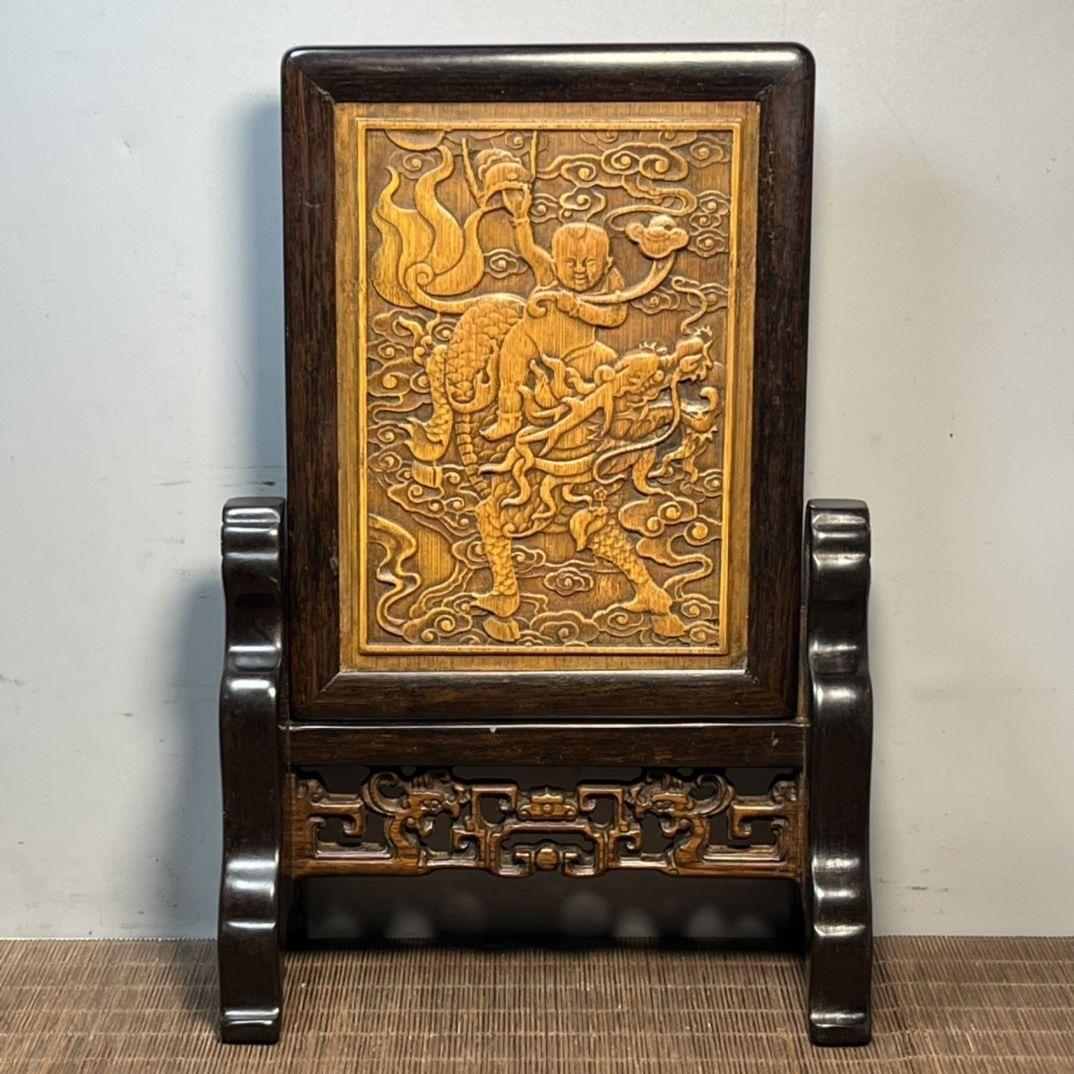 Vintage Chinese Bamboo Carving Kylin-Child Plaque with Wooden Frame & Stand – A Symbol of Prosperity and Protection

This Vintage Chinese Bamboo Carving Plaque, featuring a beautifully detailed Kylin (Qilin) with a child, is a masterpiece of