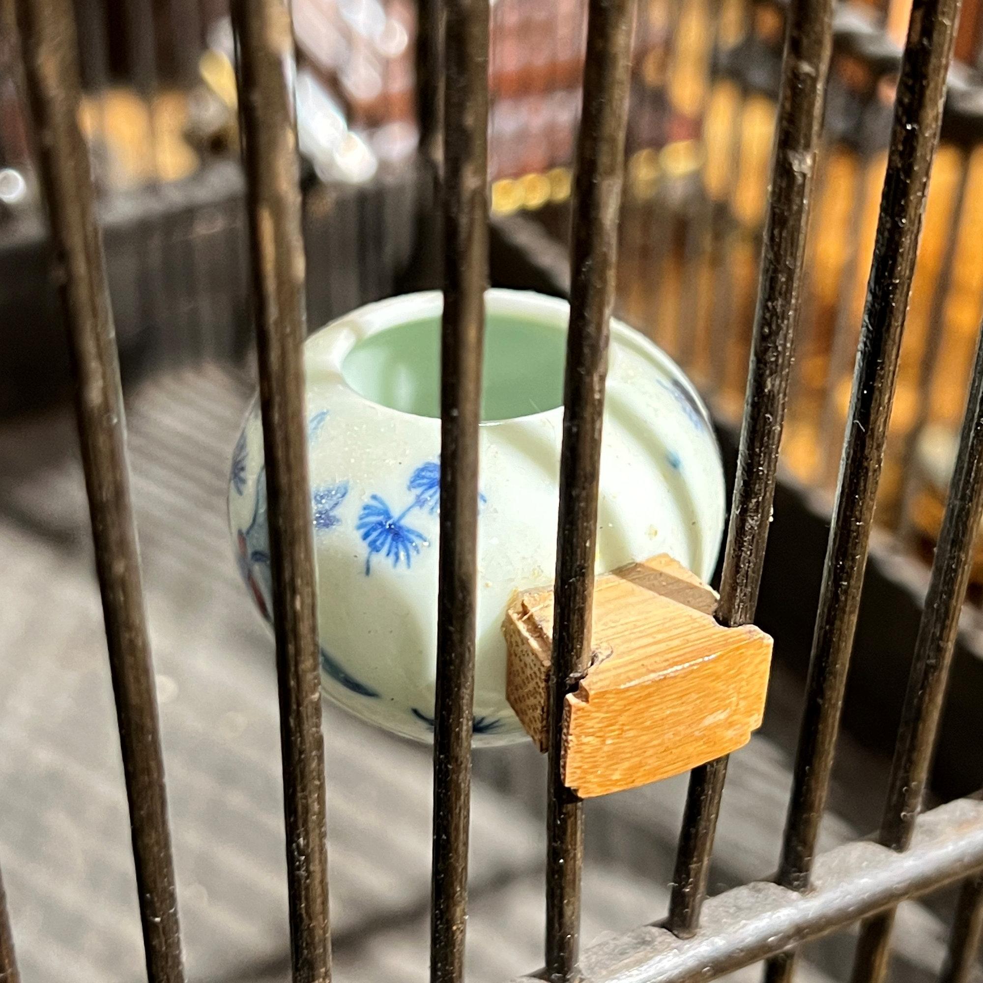 Vintage  Chinese Bird Cage with Porcelain Feeders For Sale 2