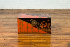 Vintage Chinese Black and Red Lacquered Trunk with Gilt Flowers and Foliage