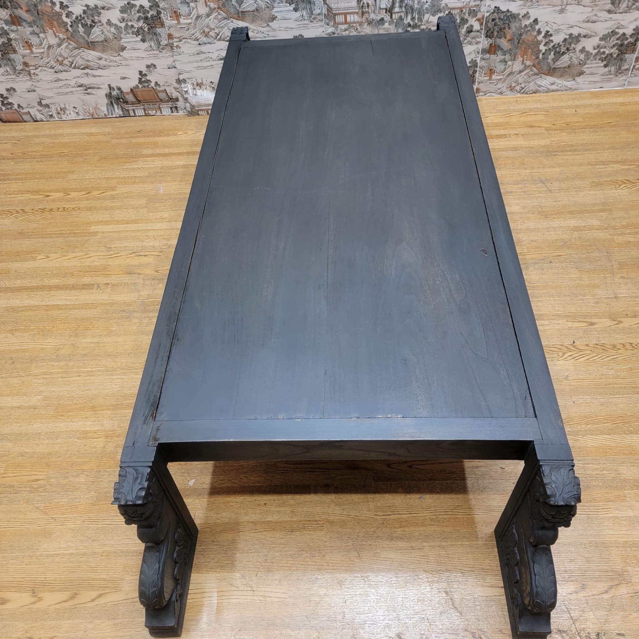 Vintage Chinese black elmwood coffee table with carved legs.

This vintage elm low coffee table has been lacquered with a unique slate / black color. The special color and patina are original.

Circa: 1999 

Dimensions:

W: 71