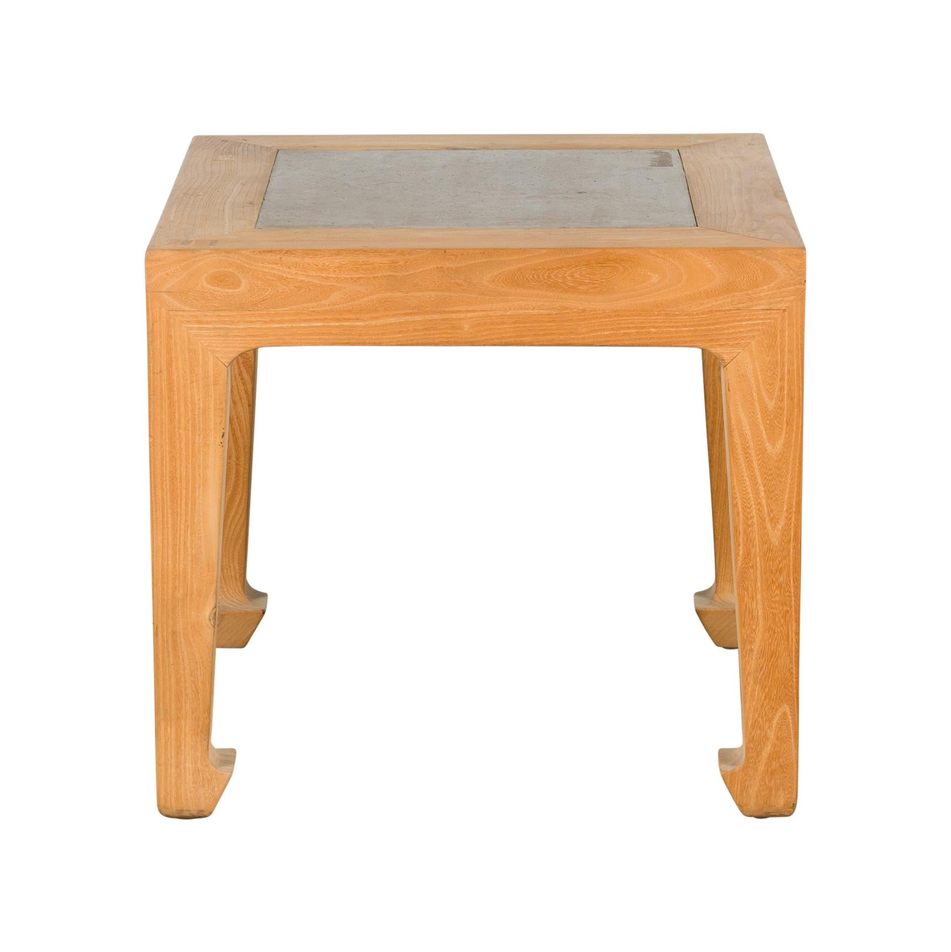 A Chinese vintage bleached elm wood square shaped side table from the mid 20th century, with inset stone tile top and horse hoof feet. Created in China during the midcentury period, this vintage bleached elm wood side table features a square top