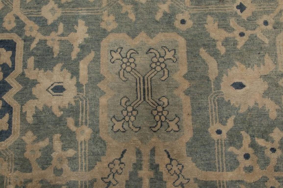 Vintage Chinese blue handwoven wool rug.
Size: 9'7