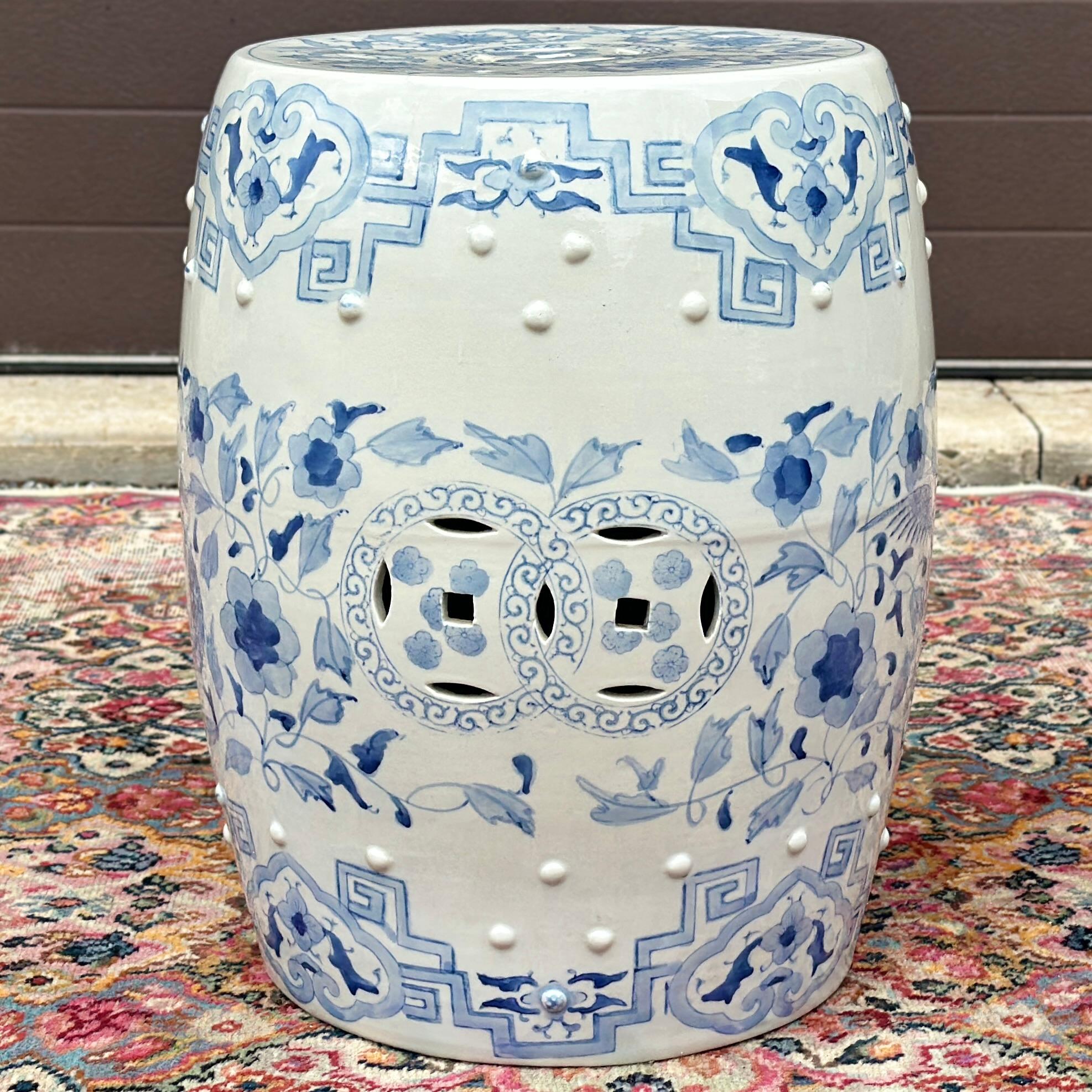 Vintage Chinese Blue & White Ceramic Garden Stool or Drum Side Table. Hand painted in traditional Chinese motifs with a dragon and phoenix on opposing sides. The top surface measures approximately 11.5