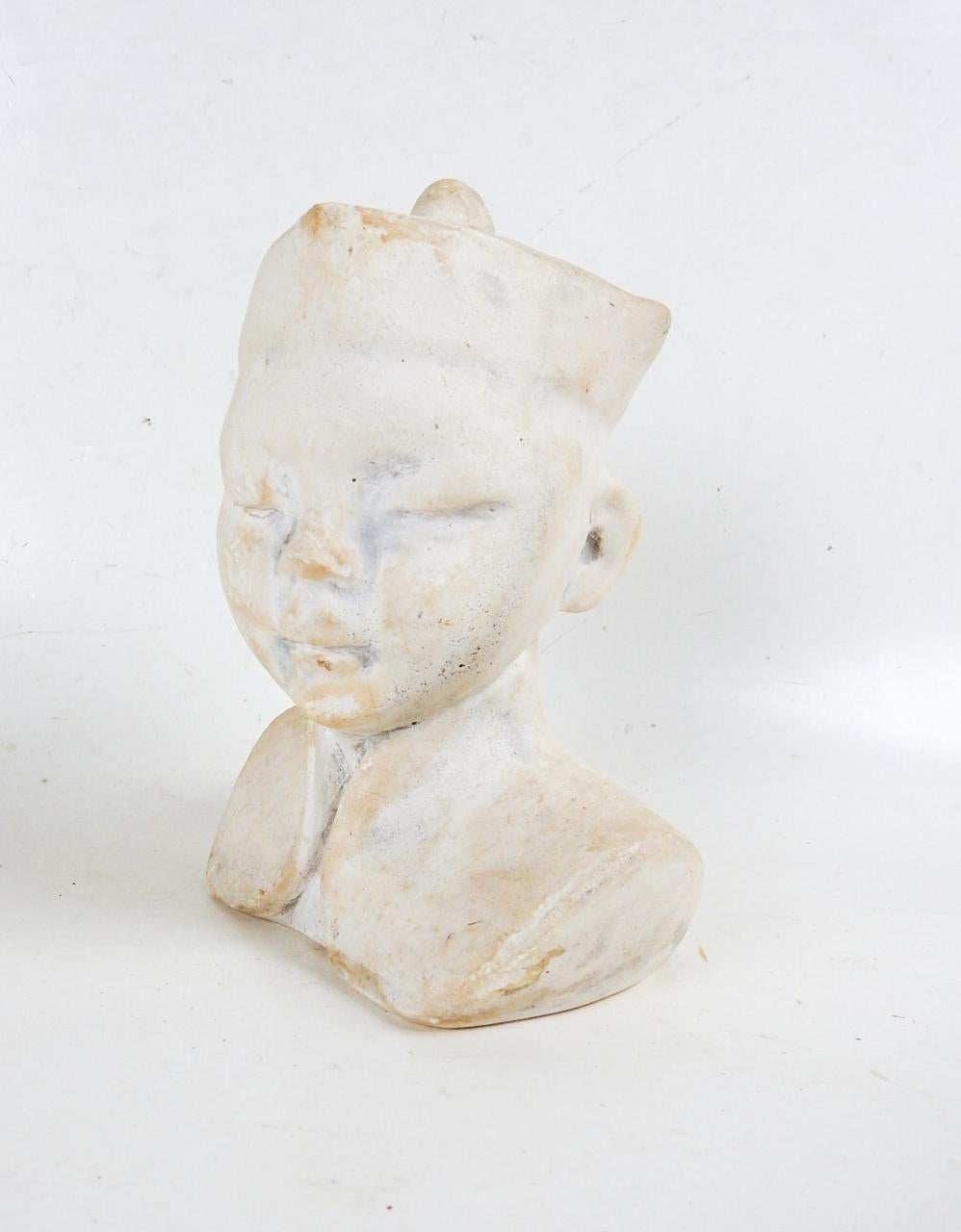 Vintage mid 20th century plaster bust of Chinese boy.  No markings, overall patina from handling, good condition.