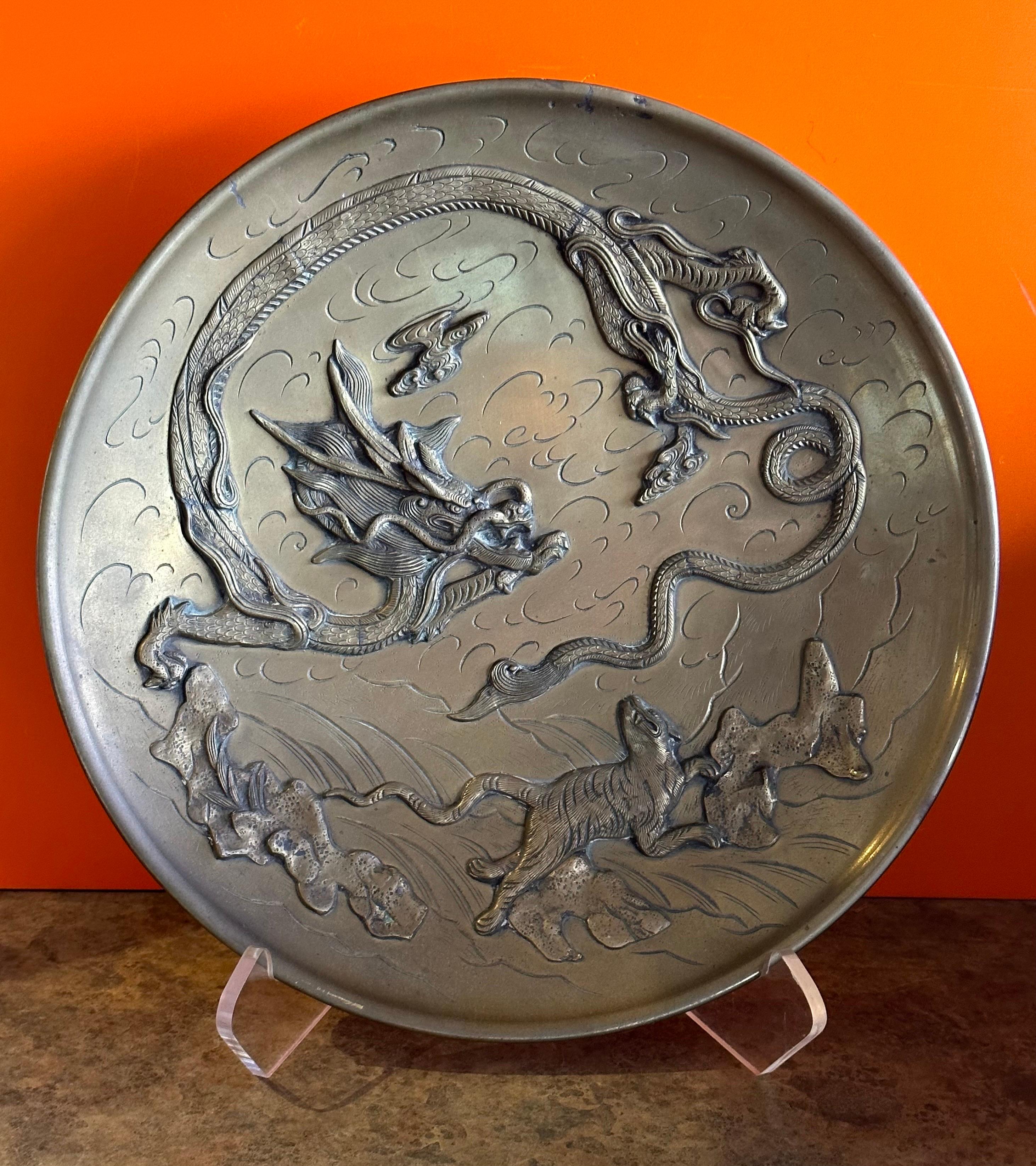 Vintage Chinese Brass Bas-Relief Dragon Charger In Good Condition For Sale In San Diego, CA