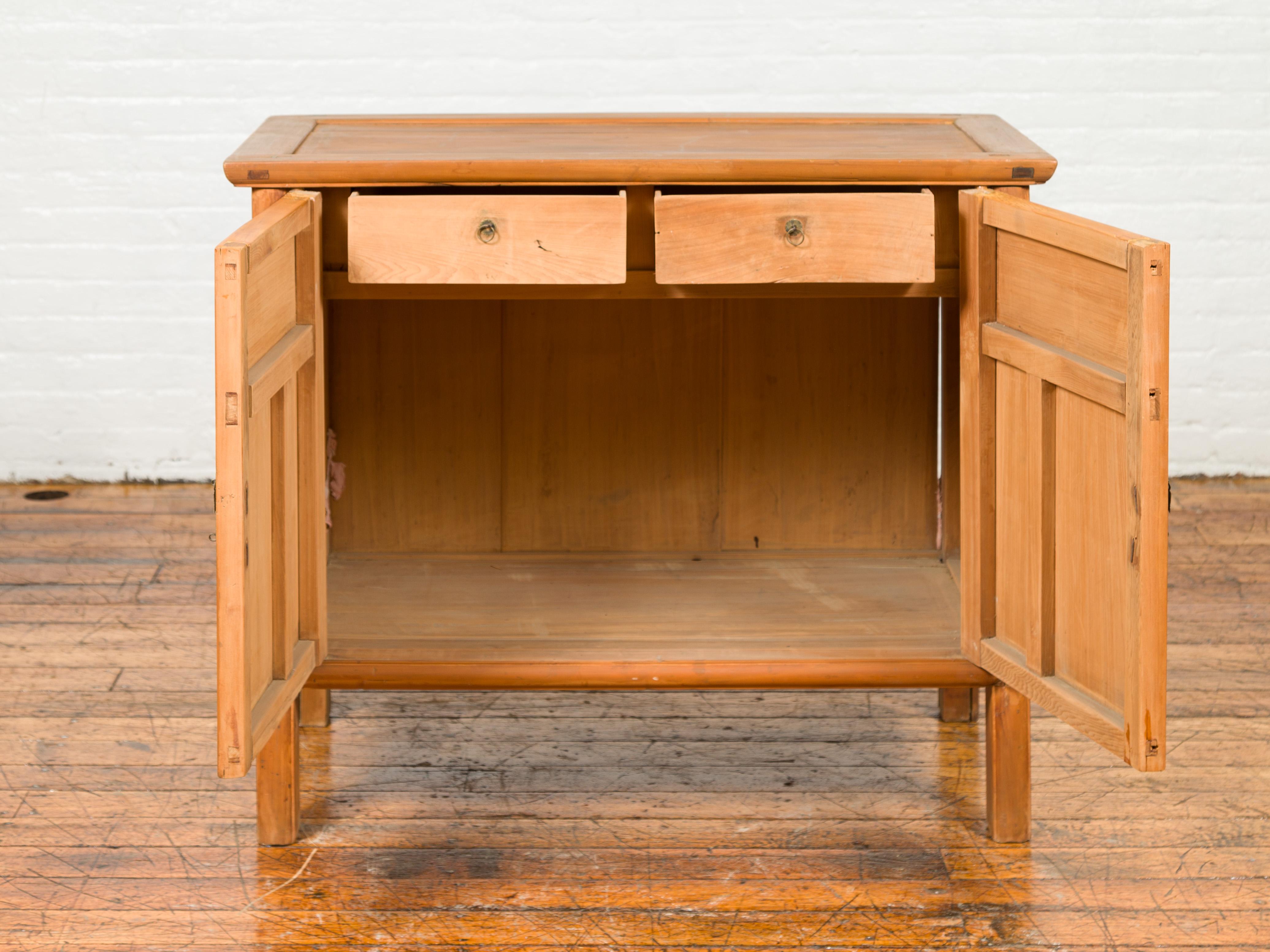 20th Century Vintage Chinese Buffet with Paneled Doors, Hidden Drawers and Natural Patina For Sale