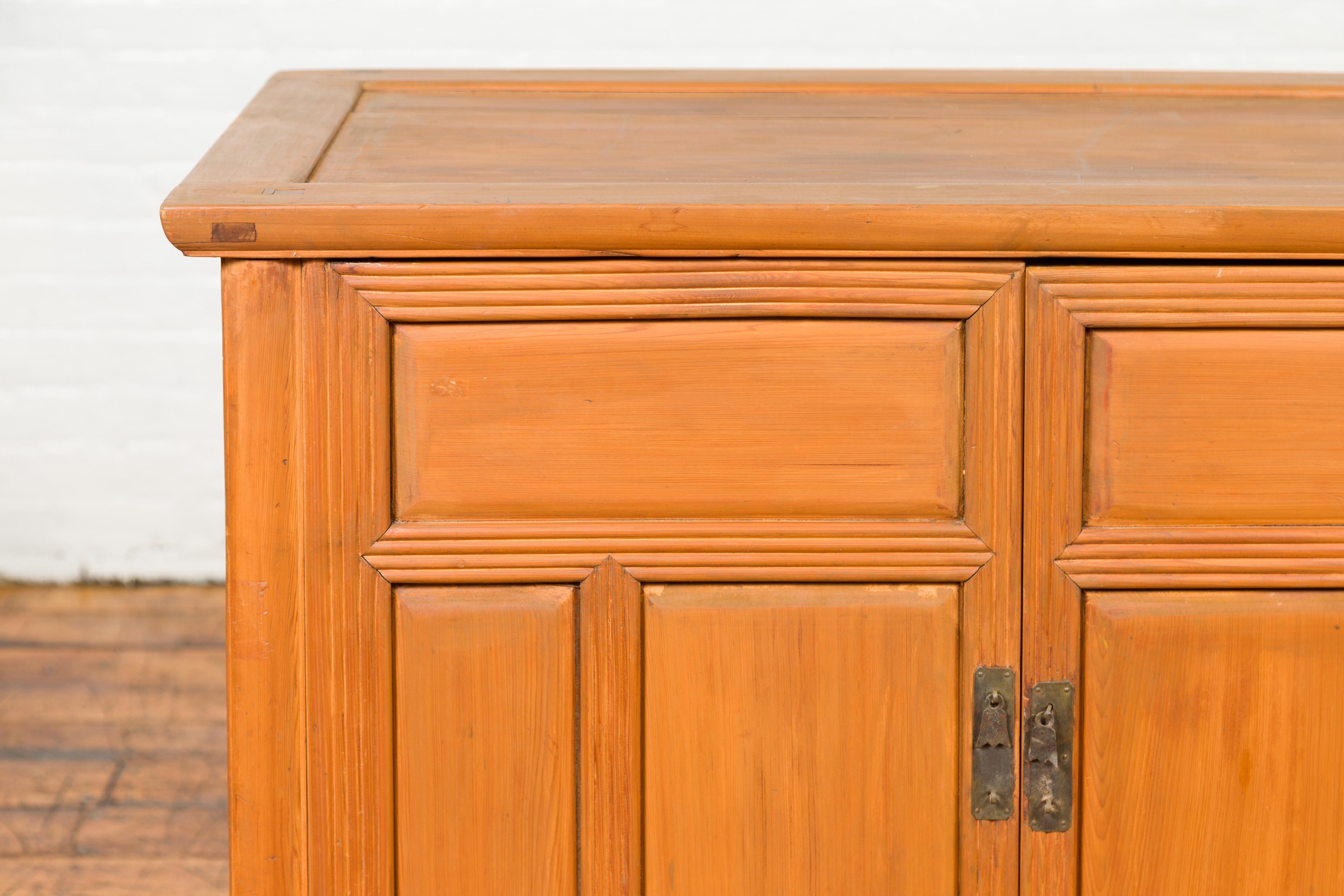 Wood Vintage Chinese Buffet with Paneled Doors, Hidden Drawers and Natural Patina For Sale