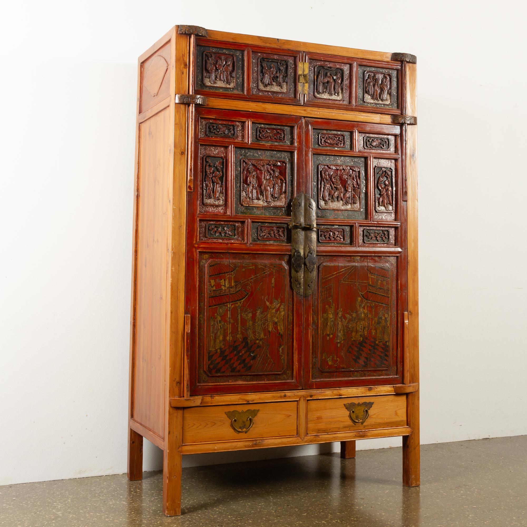 Vintage Chinese cabinet, 1950s
This beautiful wardrobe was bought in China and brought to Denmark in the 1950s. The carvings and hand painted panels appear to be much older, and is most likely from another piece of furniture that was reused