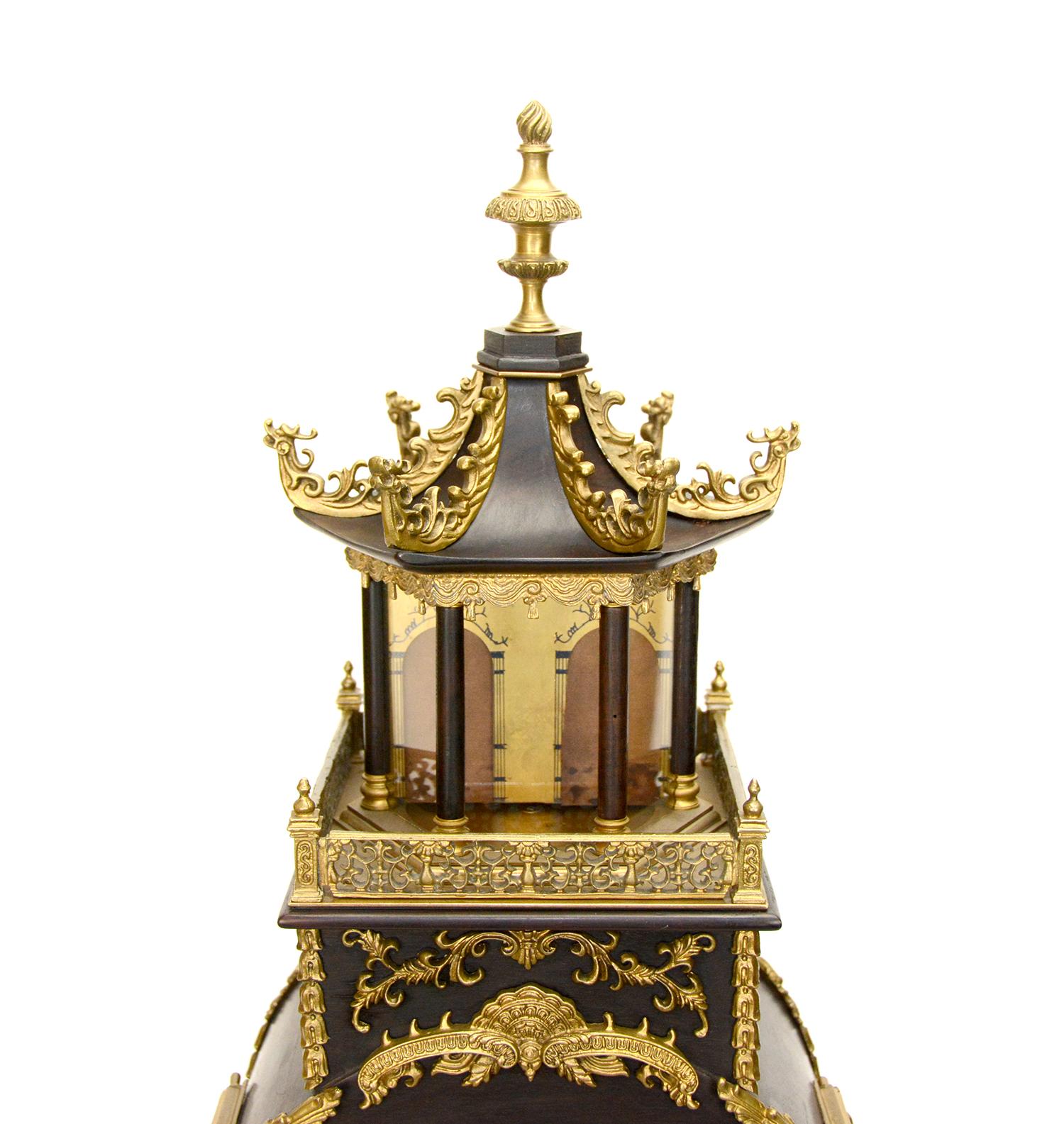Fine Canton Workshop Chinese Automaton Acrobatic Figure Musical Pagoda Bracket Clock

Here for your consideration is a large Chinese Canton bracket clock. The gorgeous hardwood case is decorated with beautiful brass casting applications. There is