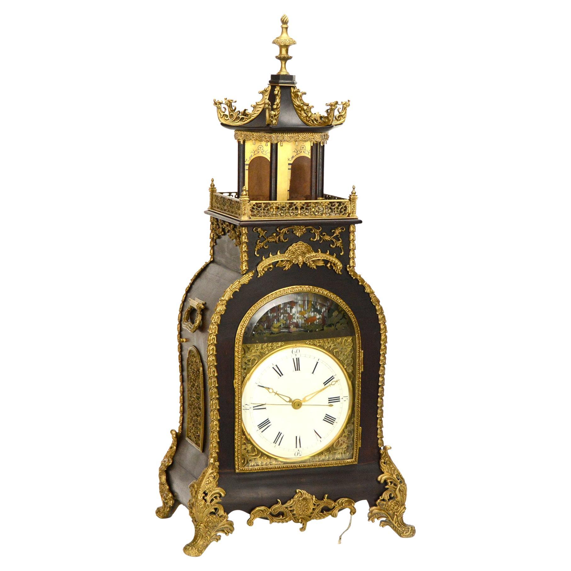 Horloge pagode chinoise vintage en forme d'acrobat à automate avec cascade musicale de Canton