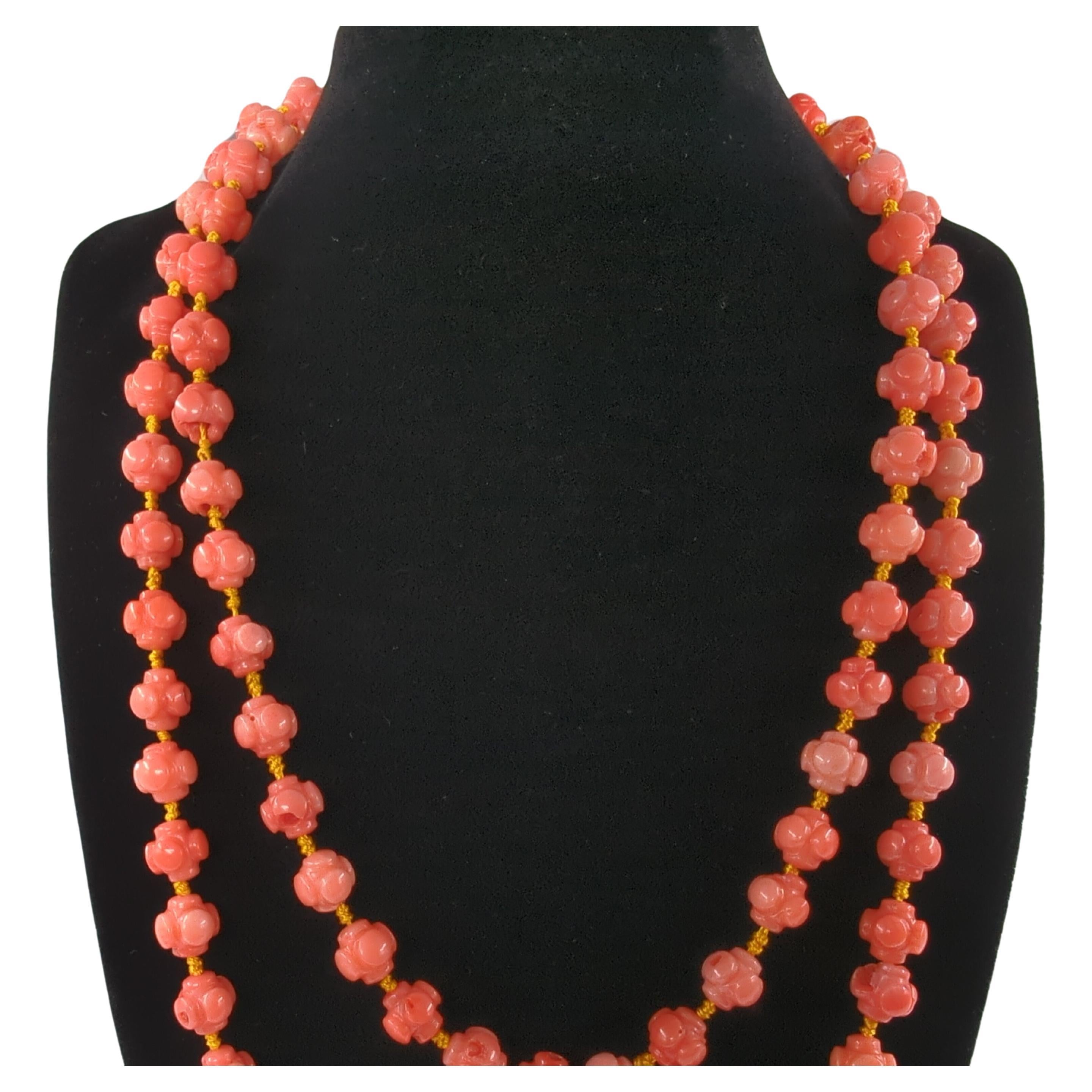 THIS ITEM CAN ONLY BE SHIPPED WITHIN CANADA, Canadian shipping address only please. Thanks and sorry for the inconvenience!

This exquisite strand of carved Chinese coral beads is a stunning testament to the art of gemstone craftsmanship. Comprising