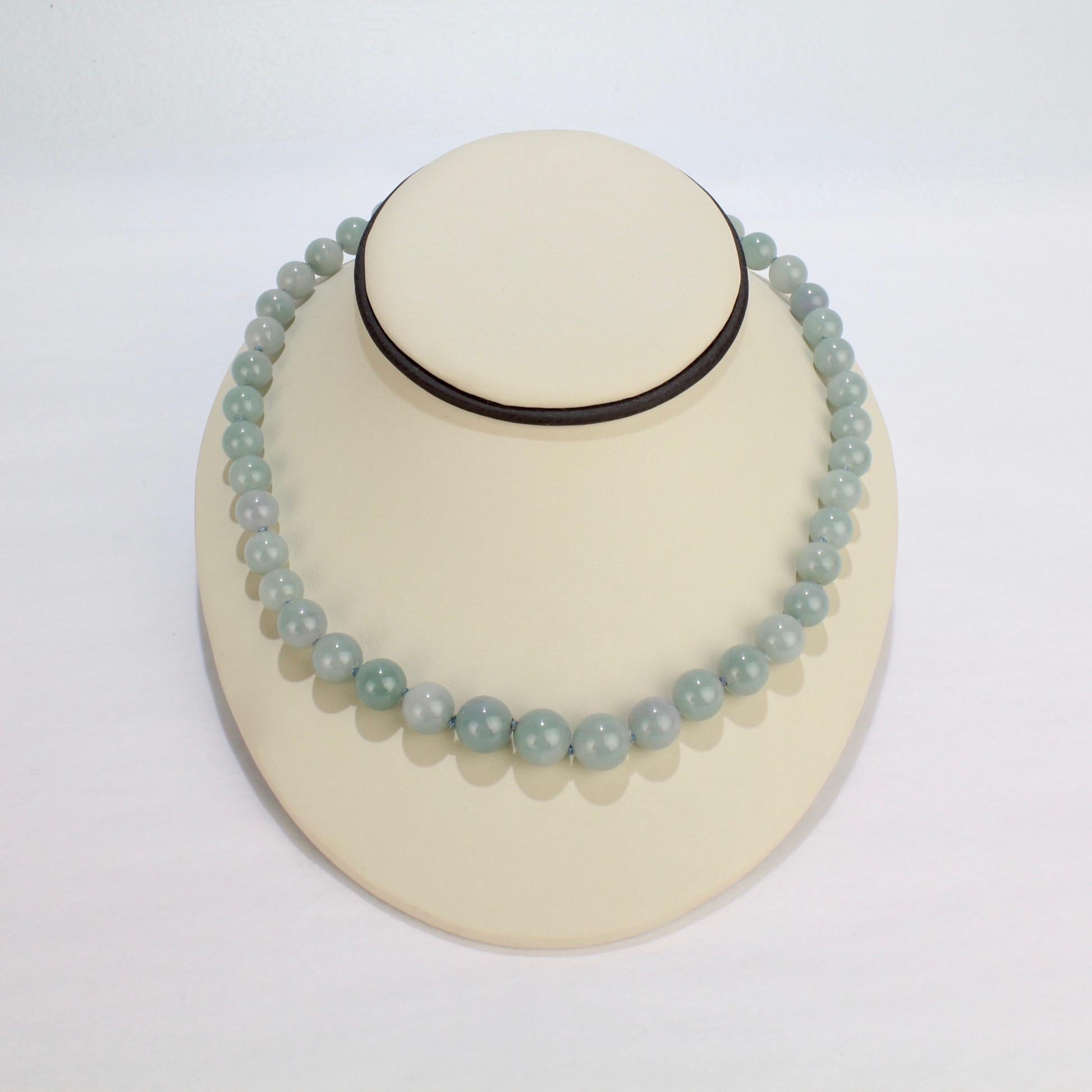 A good, vintage Chinese beaded jade necklace.

With 43 hand knotted, graduated celadon jadeite beads.

Wearing jade is thought to bring positive energy and confer good luck!

From a Pennsylvania estate.

Length: ca. 500 mm (or 19 1/2 in.)
Largest