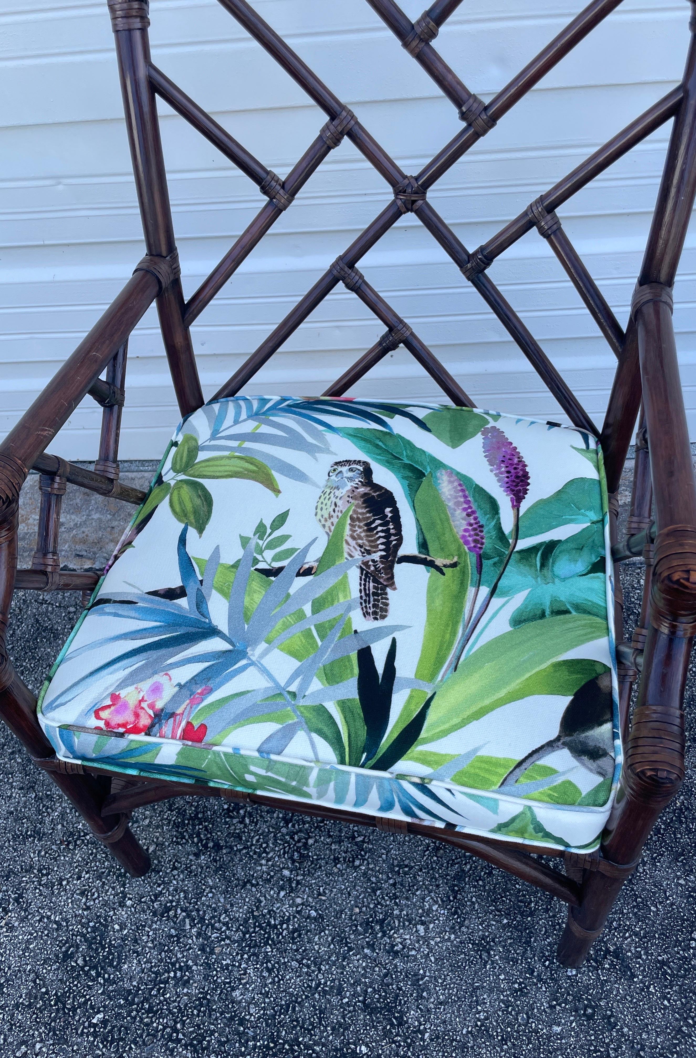 Vintage Chinese Chippendale Bamboo Armchair with newly upholstered whimsical seat cushion.