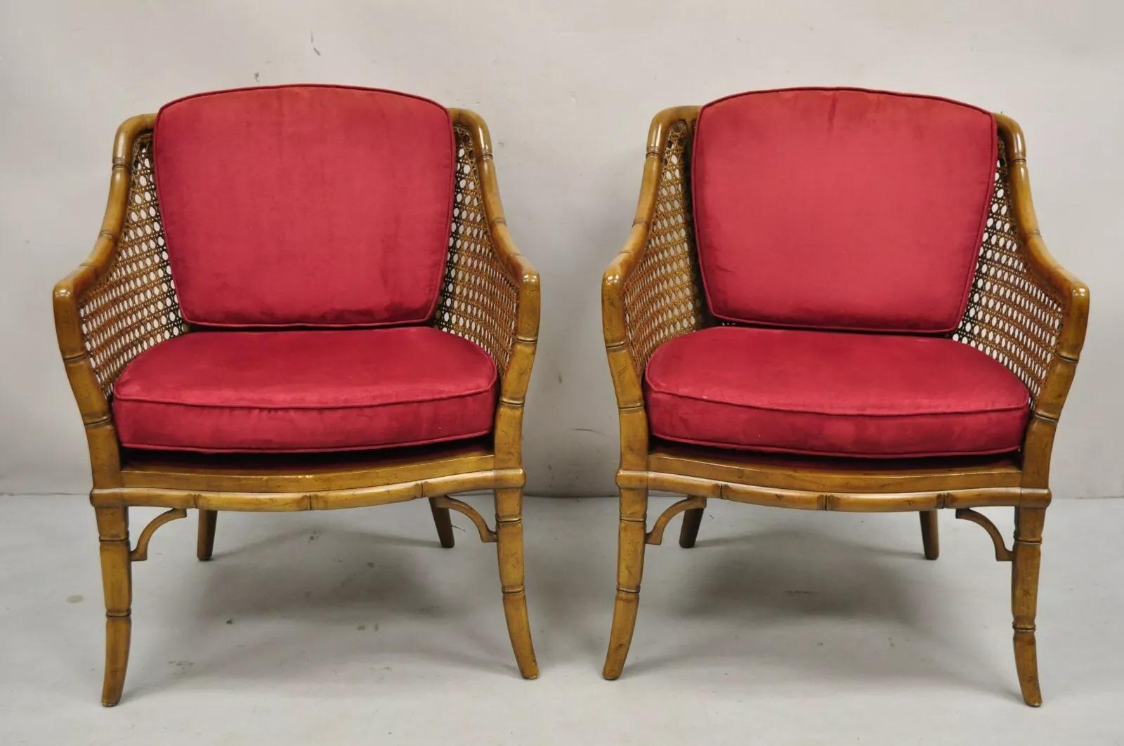 Vintage Chinese Chippendale Faux Bamboo Cane Barrel Back Lounge Club Chairs with Red Microfiber Loose Cushions - a Pair. Item features shapely saber legs, cane back and sides, solid carved wood frames, great style and form. Circa Late 20th Century.