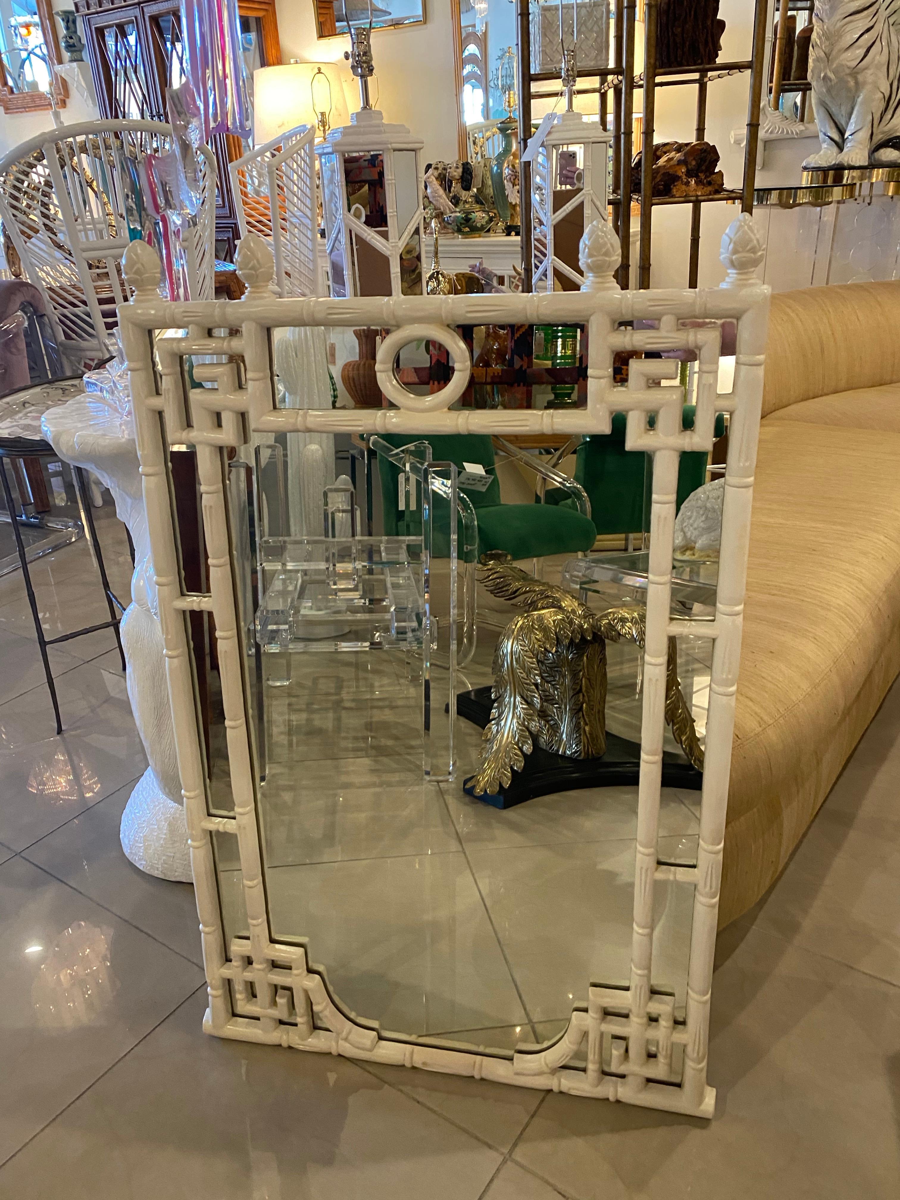 Vintage faux bamboo Greek key white wall mirror. Original white finish. Can be lacquered any color for additional cost. Ready to hang.