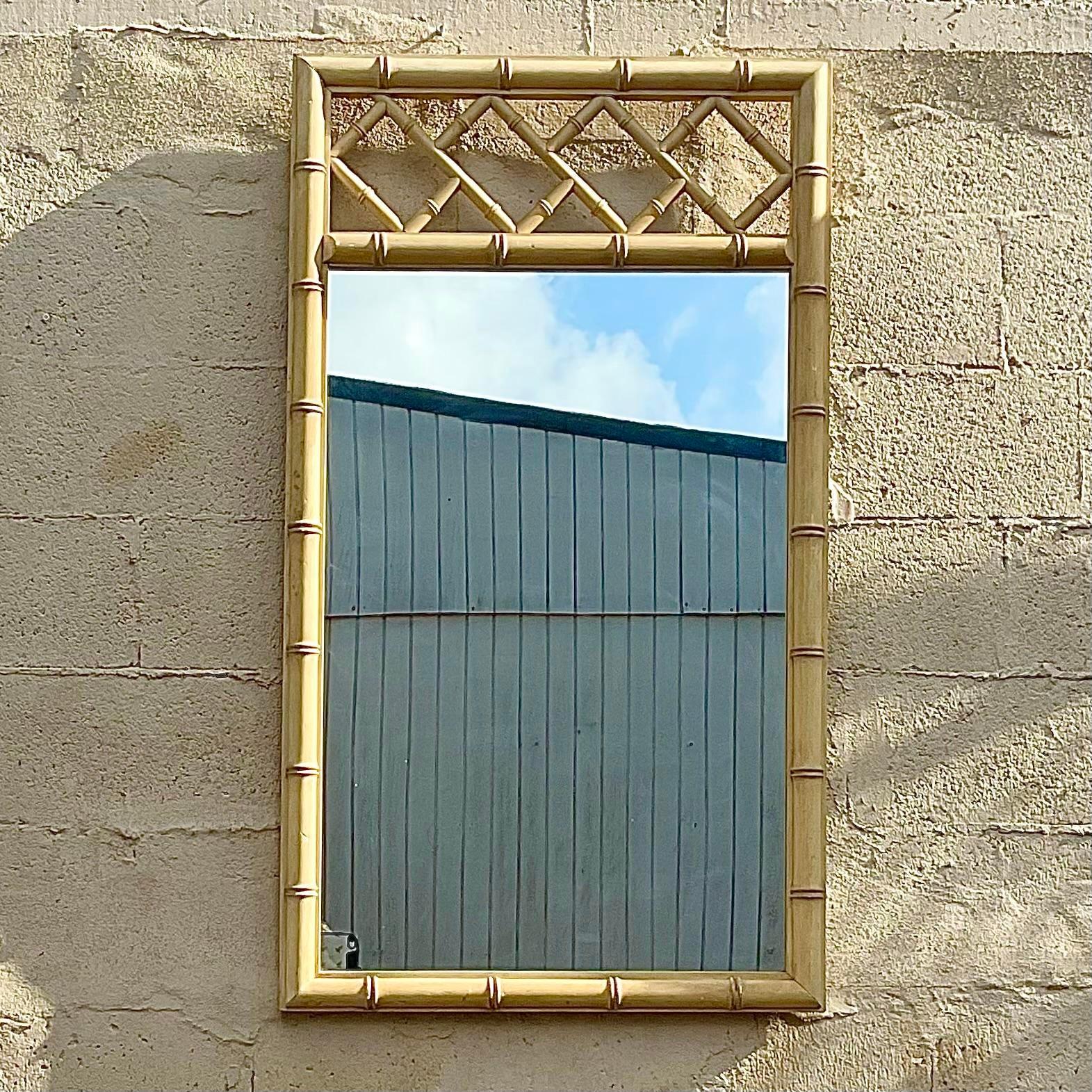 A fantastic coastal vintage chippendale wood vertical mirror that is a great addition to any room. Acquired at a Palm Beach estate. 