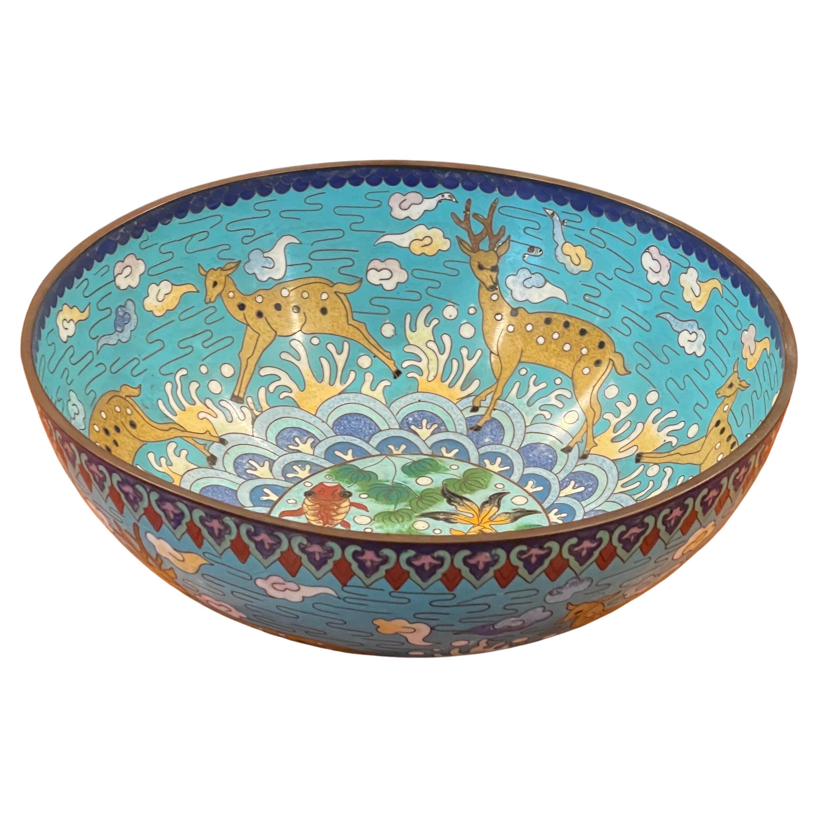 Vintage Chinese cloisonné bowl with deer and koi fish motif, circa 1950s. The piece is is in very good vintage condition and measures 10